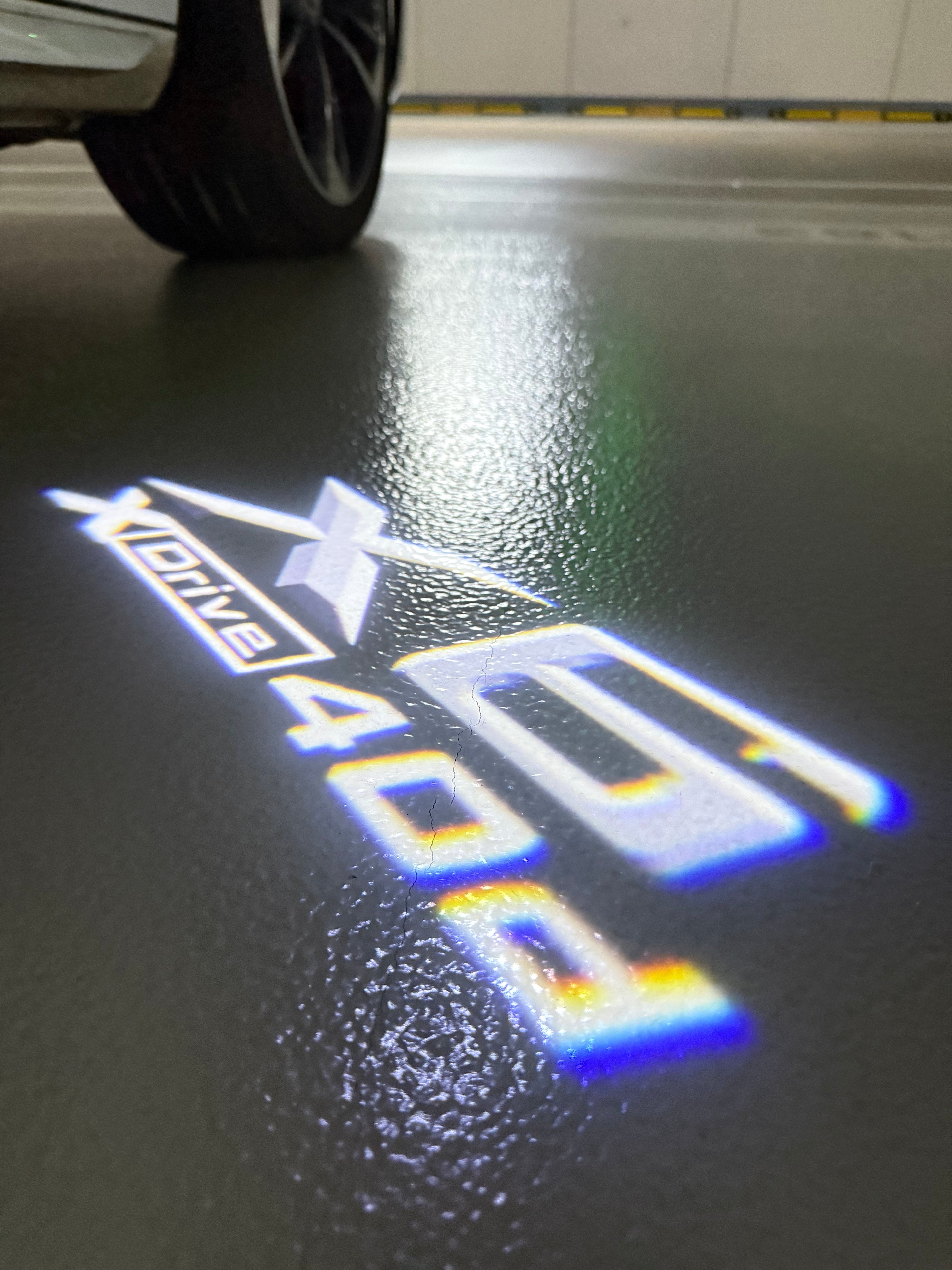 BMW X6 Xdrive  LOGO PROJECTOT LIGHTS (quantity 1 = 1 sets/2 door lights)Nr.bmw0083
