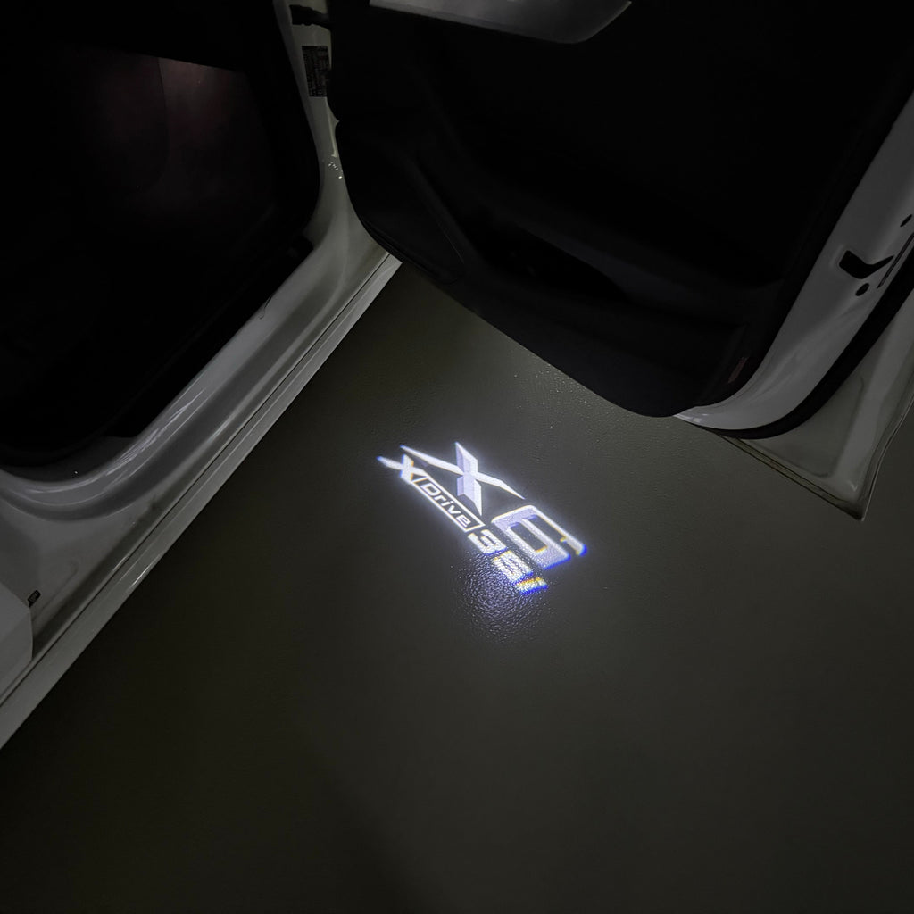 BMW X6 Xdrive  LOGO PROJECTOT LIGHTS (quantity 1 = 1 sets/2 door lights)Nr.bmw0087