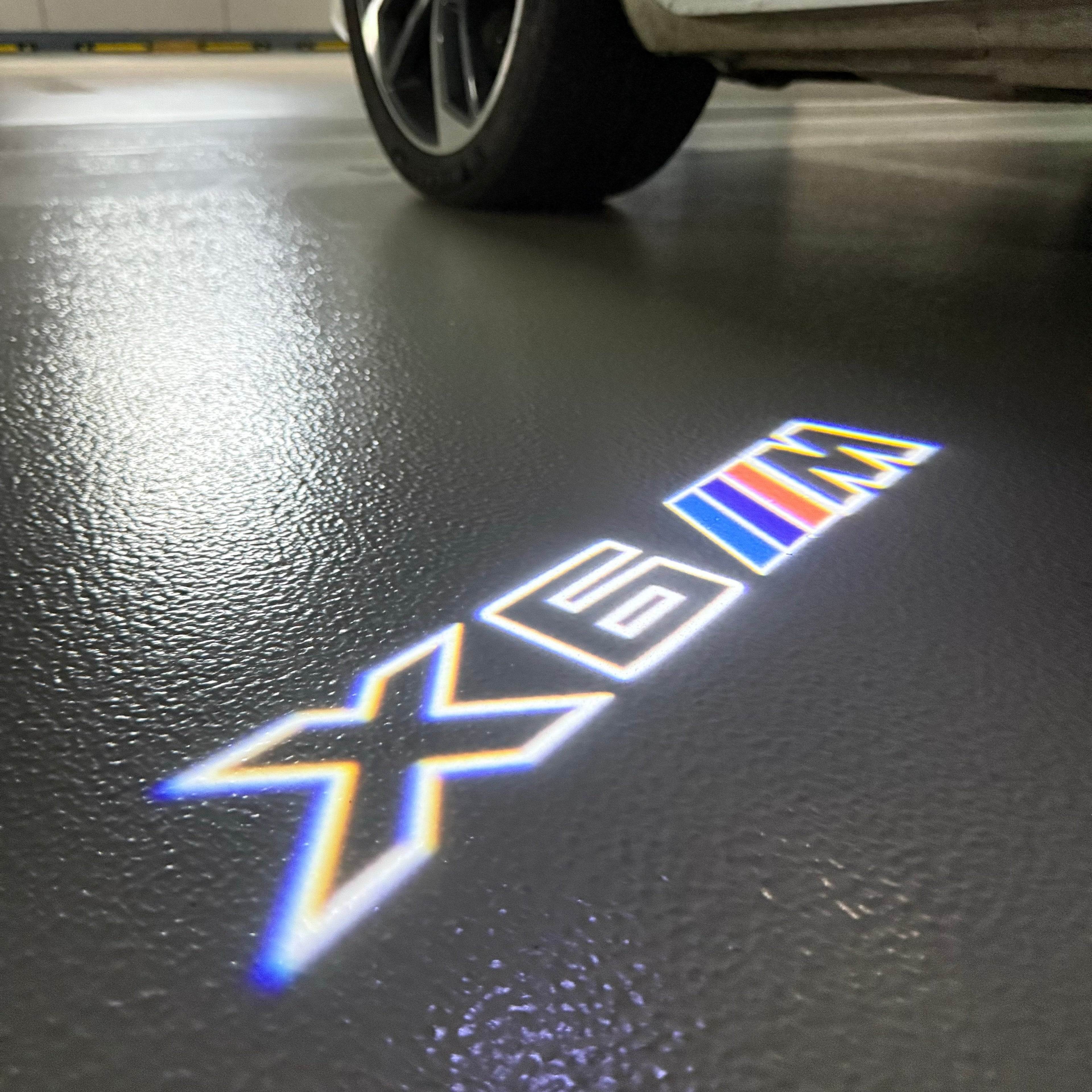 BMW  X6M LOGO PROJECTOT LIGHTS (quantity 1 = 1 sets/2 door lights)Nr.bmw0077