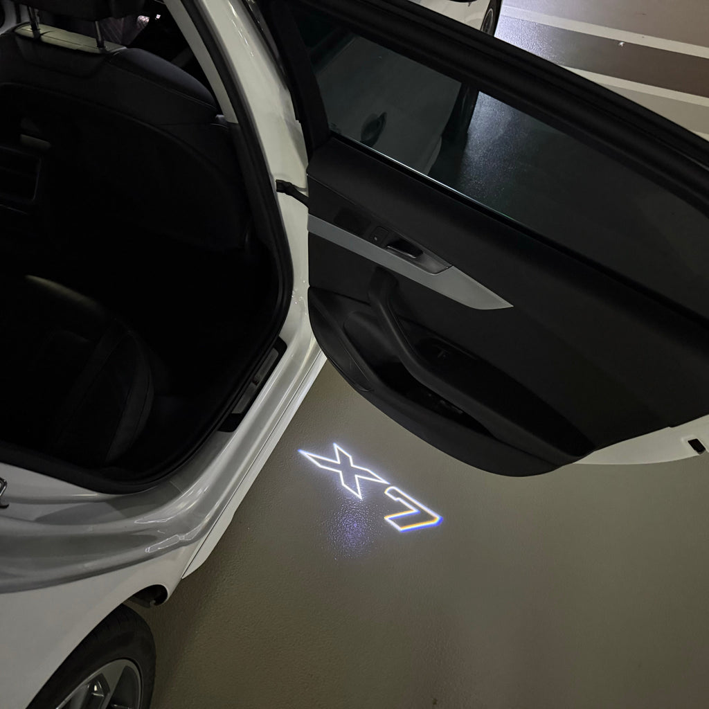 BMW X7  LOGO PROJECTOT LIGHTS (quantity 1 = 1 sets/2 door lights)Nr.bmw0076