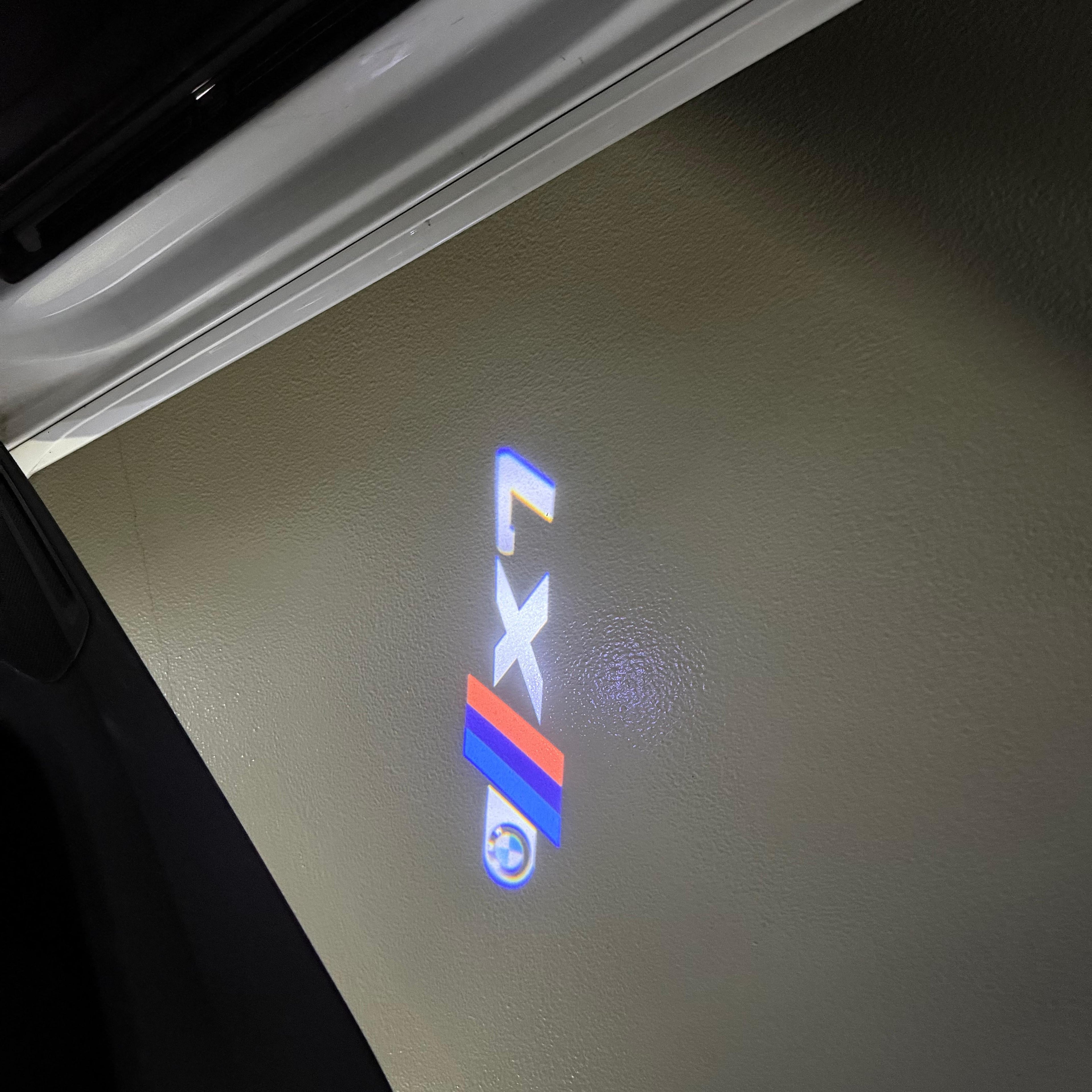 BMW X7  LOGO PROJECTOT LIGHTS (quantity 1 = 1 sets/2 door lights)Nr.bmw0074
