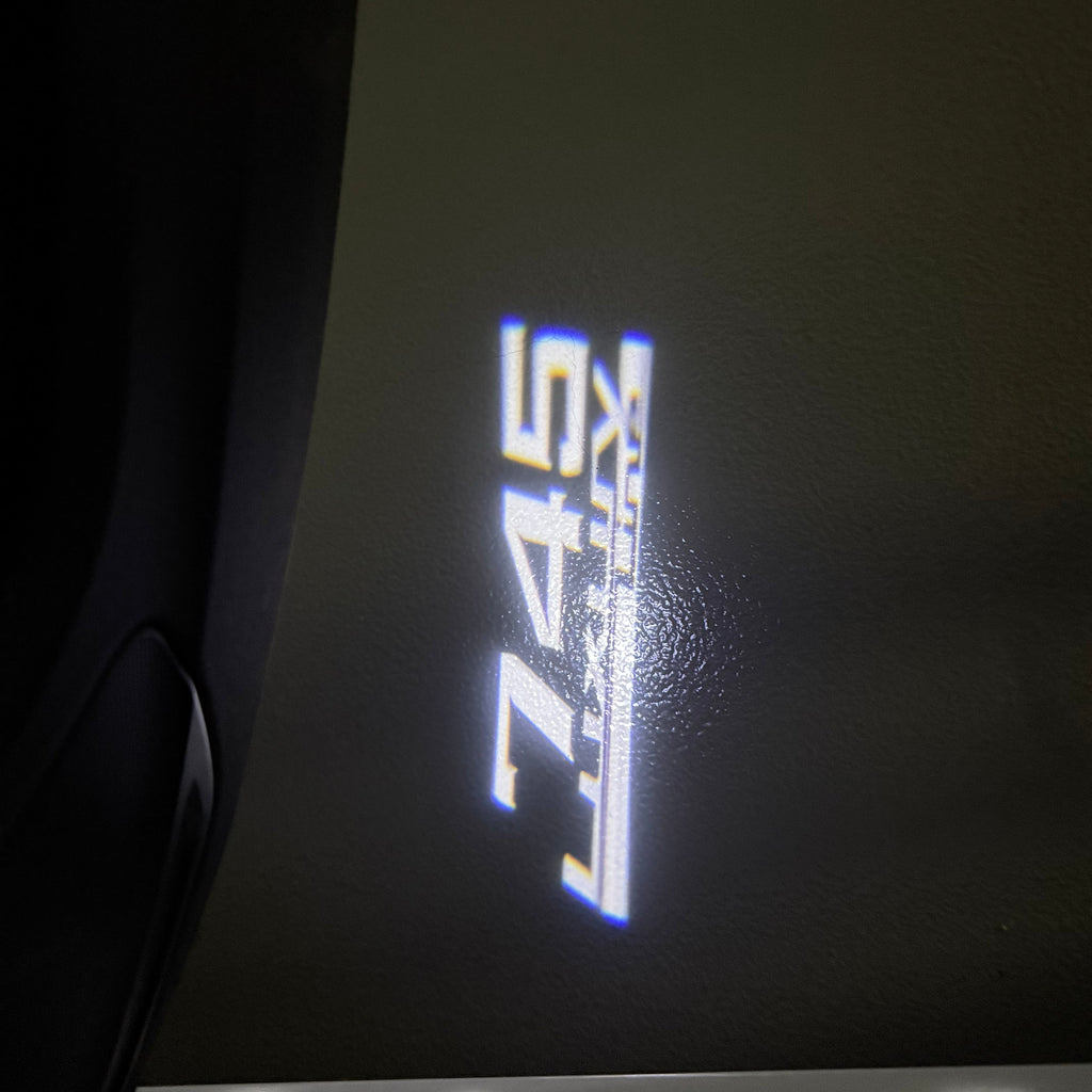 BMW 7 SERIES 745   LOGO PROJECTOT LIGHTS (quantity 1 = 1 sets/2 door lights)Nr.bmw00309