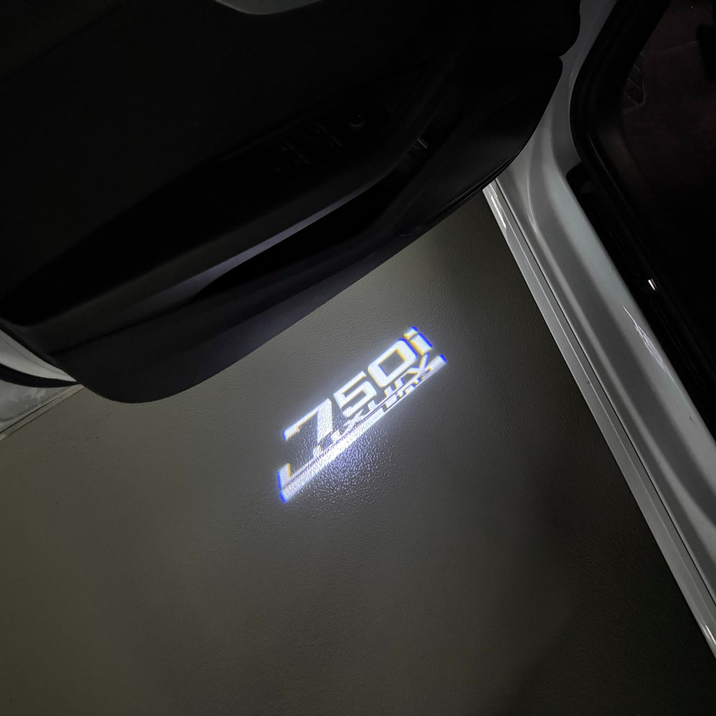 BMW   7 SERIES 750 i  LOGO PROJECTOT LIGHTS (quantity 1 = 1 sets/2 door lights)Nr.bmw00310