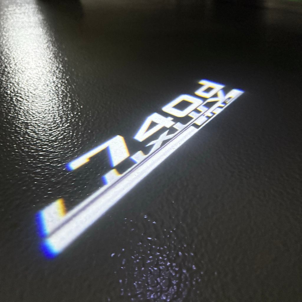 BMW  7 SERIES 740 d LOGO PROJECTOT LIGHTS (quantity 1 = 1 sets/2 door lights)Nr.bmw00311