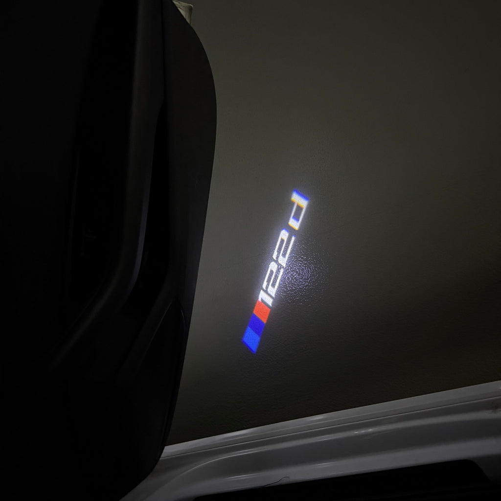 BMW 1 SERIES  122   LOGO PROJECTOT LIGHTS (quantity 1 = 1 sets/2 door lights)Nr.bmw00129