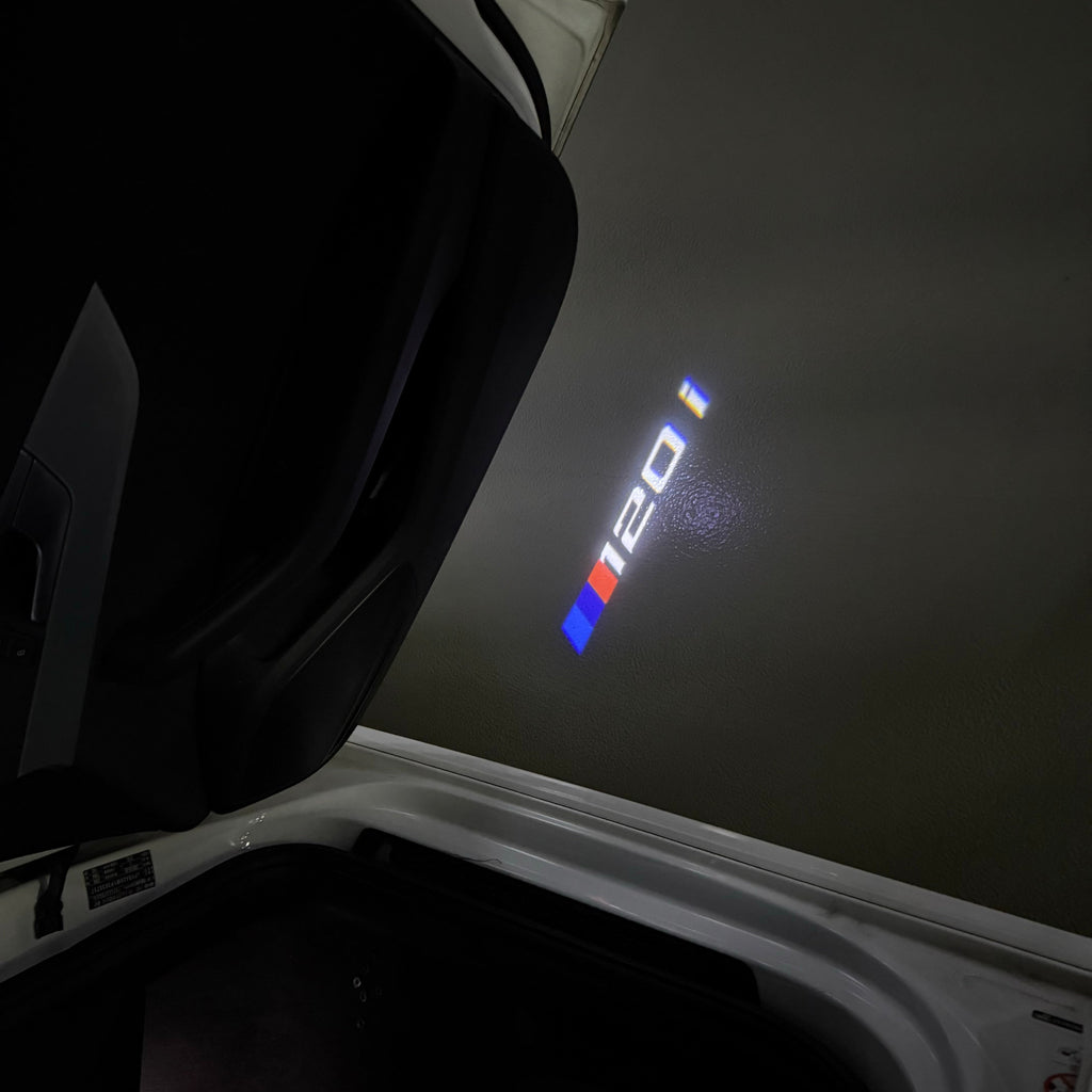 BMW 1 SERIES  120    LOGO PROJECTOT LIGHTS (quantity 1 = 1 sets/2 door lights)Nr.bmw00130