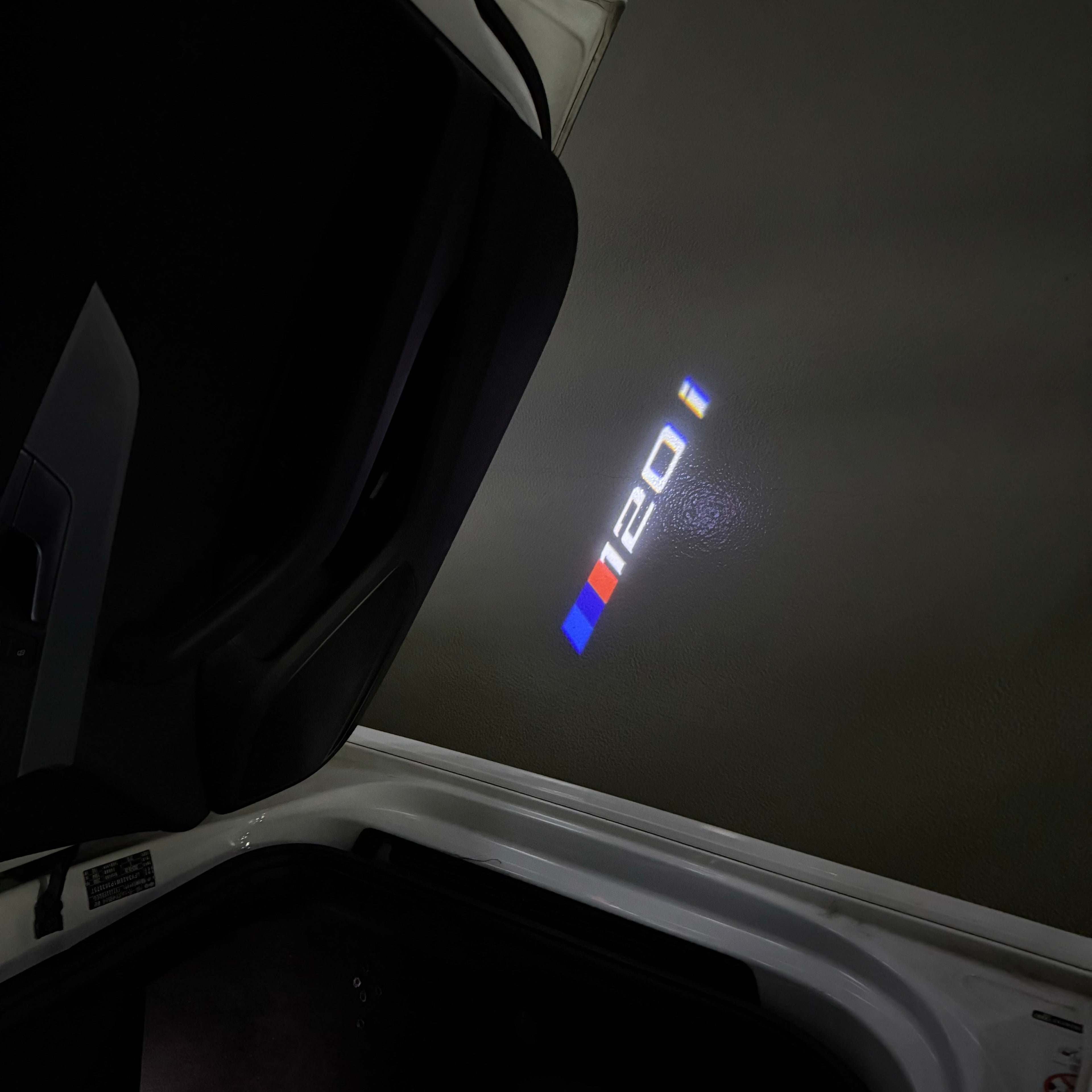BMW 1 SERIES  120    LOGO PROJECTOT LIGHTS (quantity 1 = 1 sets/2 door lights)Nr.bmw00130