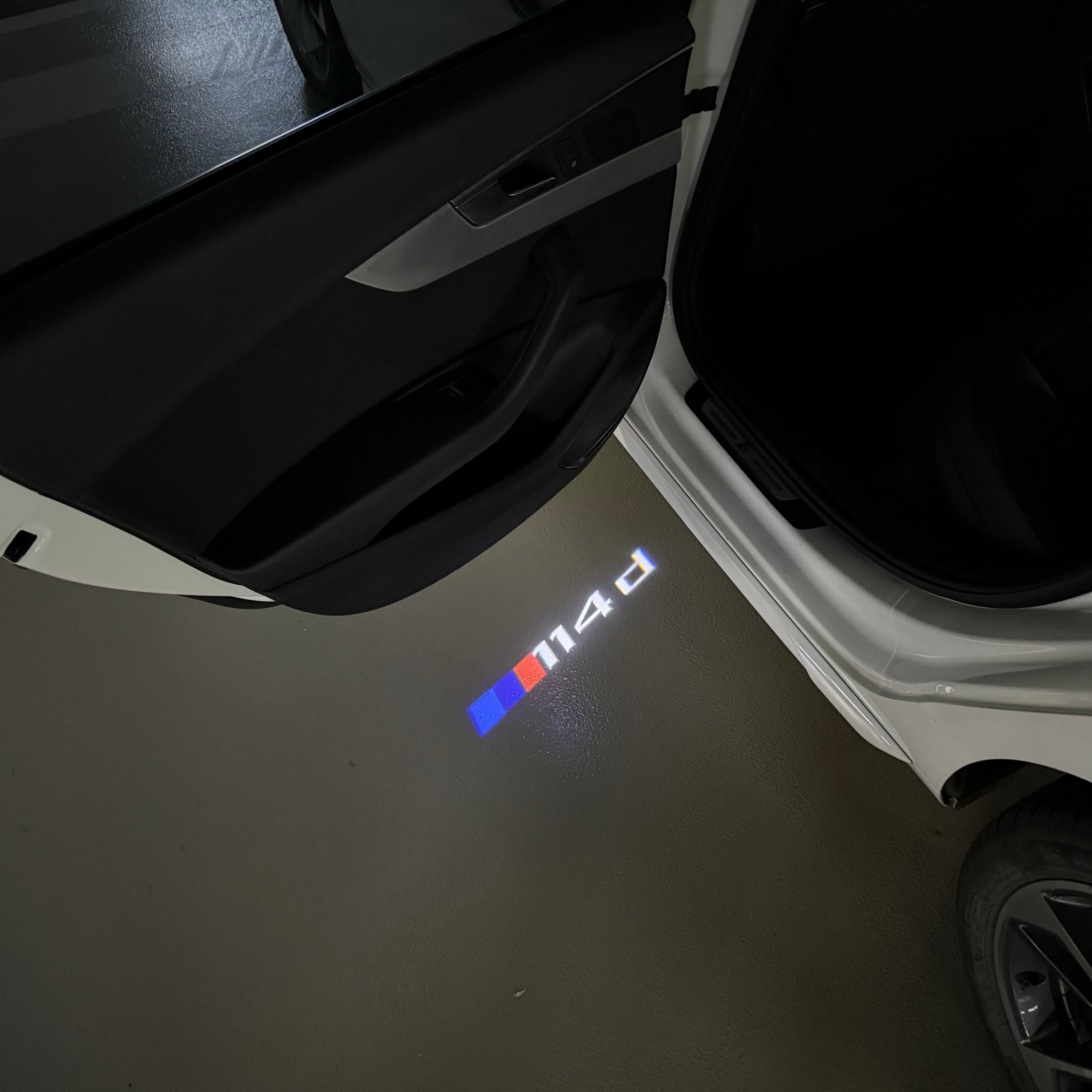 BMW 1 SERIES  114   LOGO PROJECTOT LIGHTS (quantity 1 = 1 sets/2 door lights)Nr.bmw00379