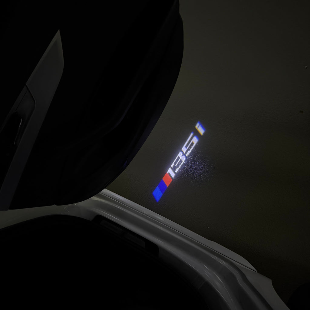 BMW 1 SERIES 135   LOGO PROJECTOT LIGHTS (quantity 1 = 1 sets/2 door lights)Nr.bmw00217