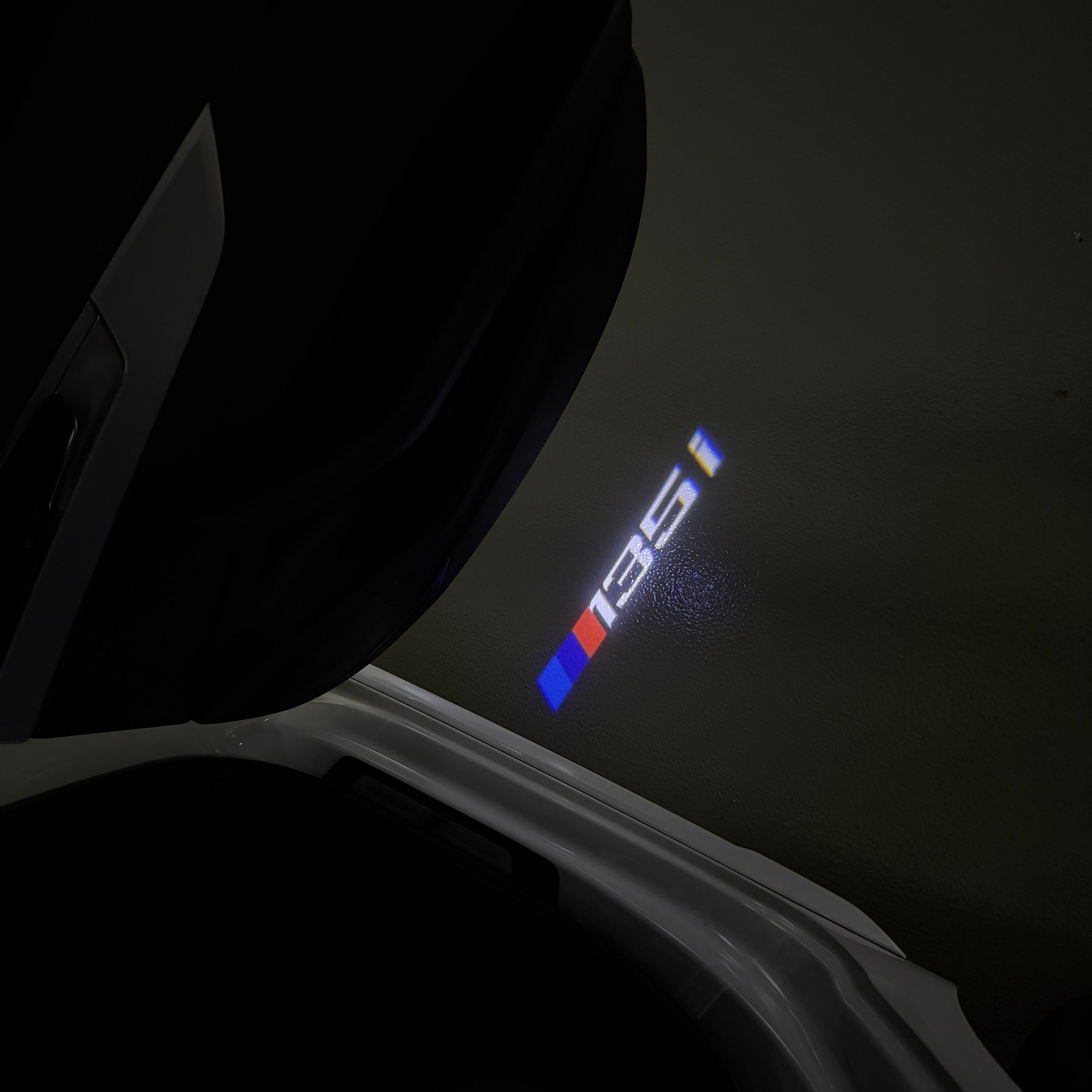 BMW 1 SERIES 135   LOGO PROJECTOT LIGHTS (quantity 1 = 1 sets/2 door lights)Nr.bmw00217