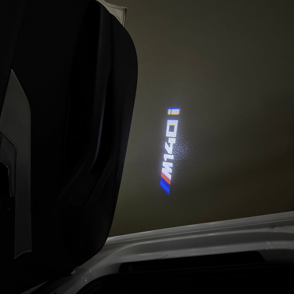 BMW 1 SERIES  M140  LOGO PROJECTOT LIGHTS (quantity 1 = 1 sets/2 door lights)Nr.bmw00377