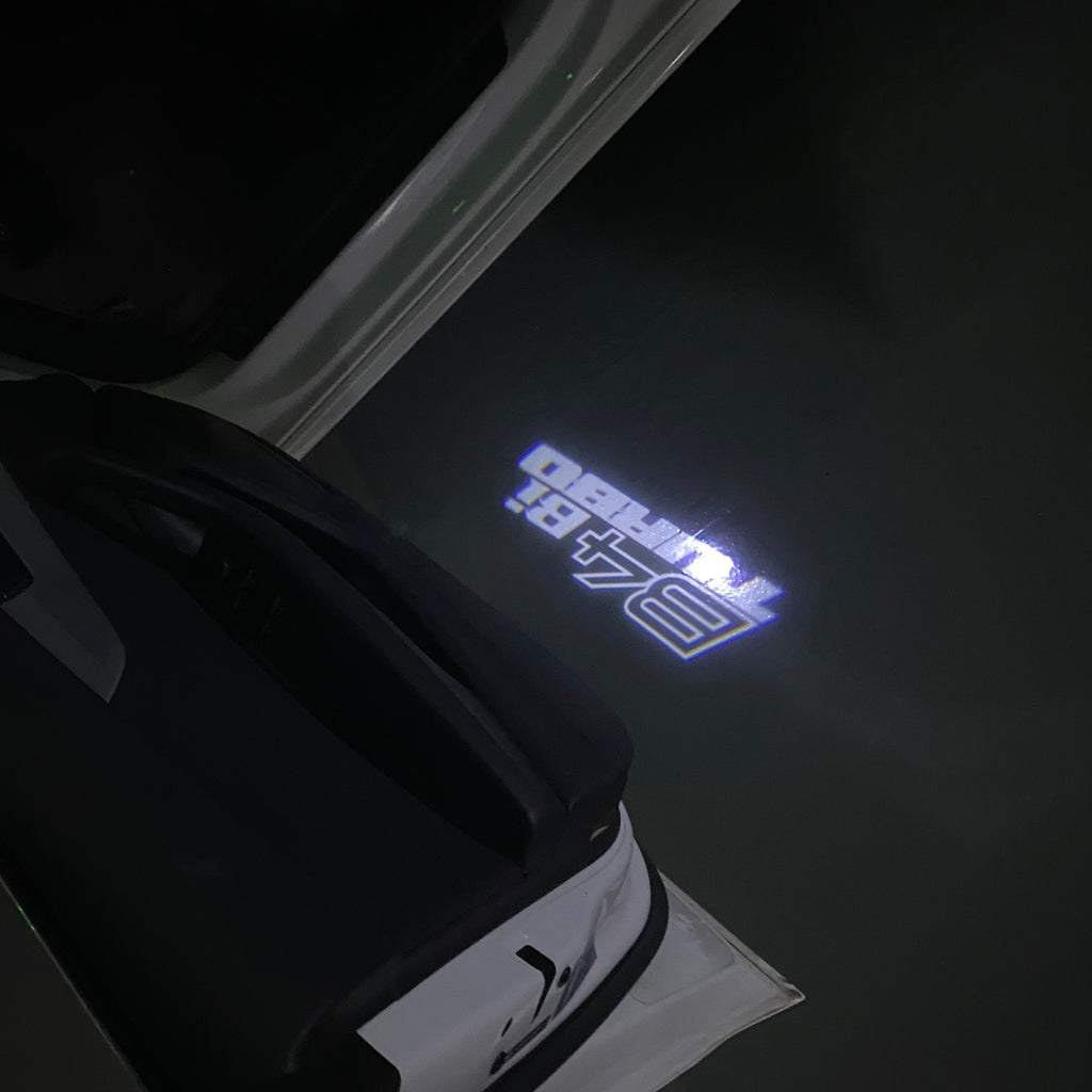 ALPINA B4  Bi TURBO LOGO PROJECTOT LIGHTS  (quantity 1 = 1 sets/2 door lights) Nr.07A49