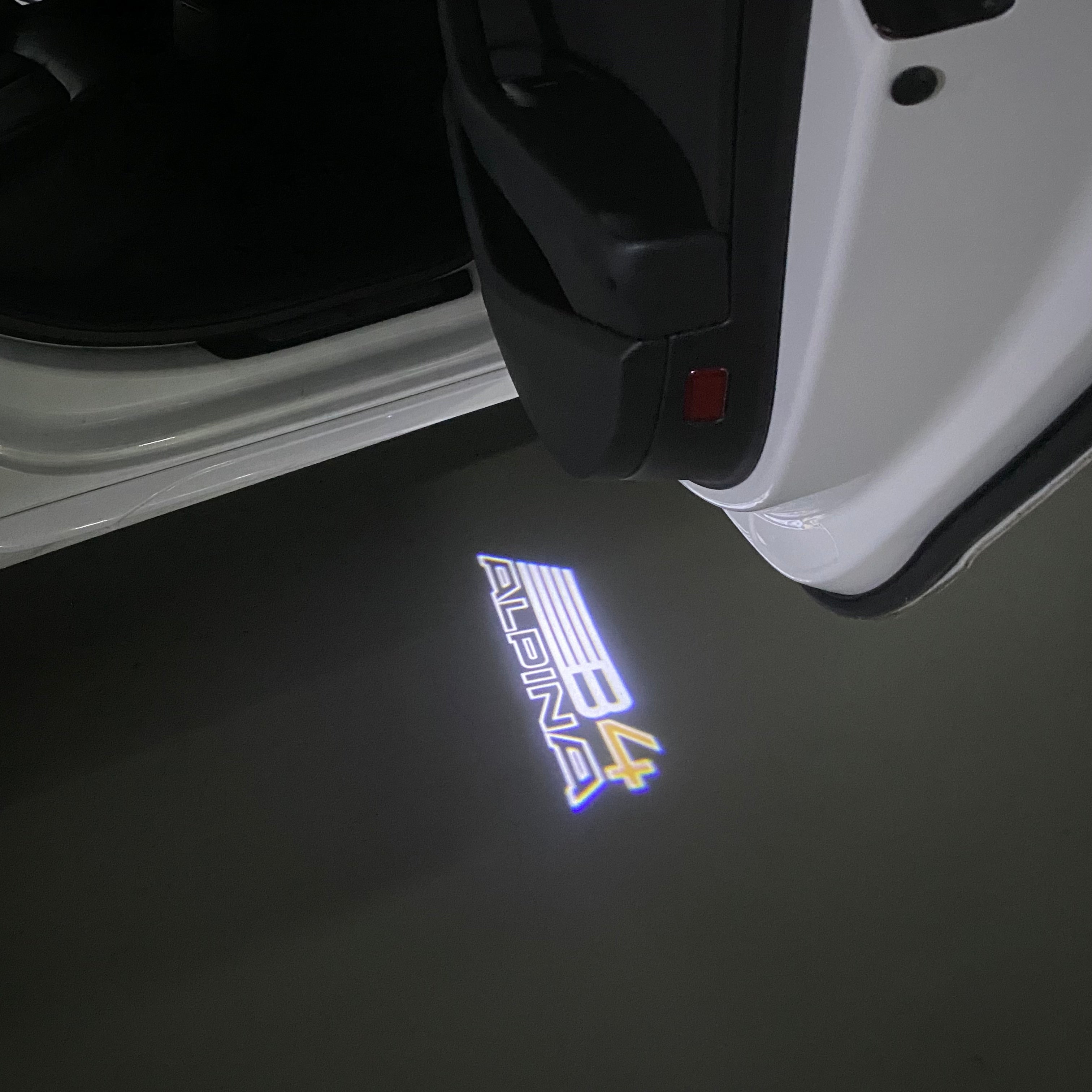 ALPINA B4 LOGO PROJECTOT LIGHTS  (quantity 1 = 1 sets/2 door lights)Nr.099B03