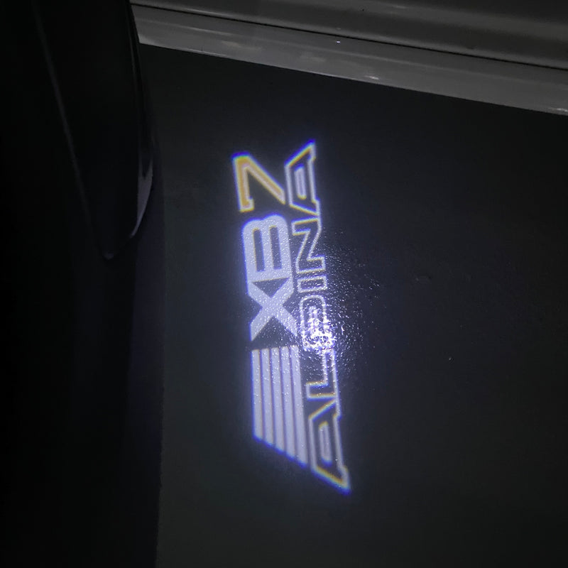 ALPINA LOGO PROJECTOT LIGHTS Nr.099 (quantità 1 = 1 set/2 luci porta)