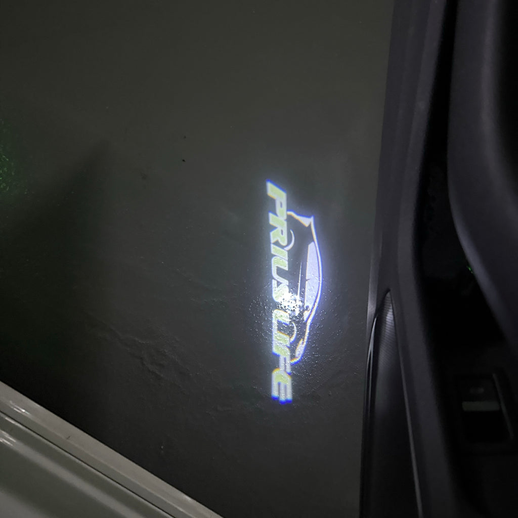 Toyota  PRIUS LOGO PROJECROTR LIGHTS Nr.02 (quantity 1 = 1 sets/2 door lights)T62