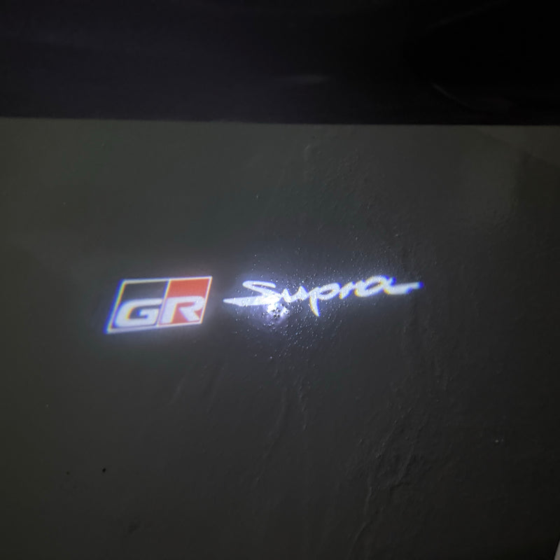 Toyota  Orignal LOGO PROJECROTR LIGHTS Nr.02 (quantity 1 = 1 sets/2 door lights)T68