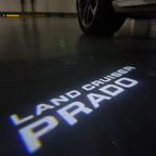 Toyota  LAND CRUISER LOGO PROJECROTR LIGHTS Nr.02 (quantity 1 = 1 sets/2 door lights)T54