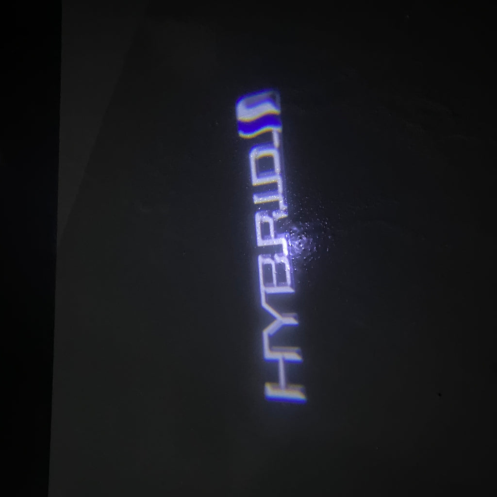 Toyota  HYBRID LOGO PROJECROTR LIGHTS Nr.02 (quantity 1 = 1 sets/2 door lights)T73