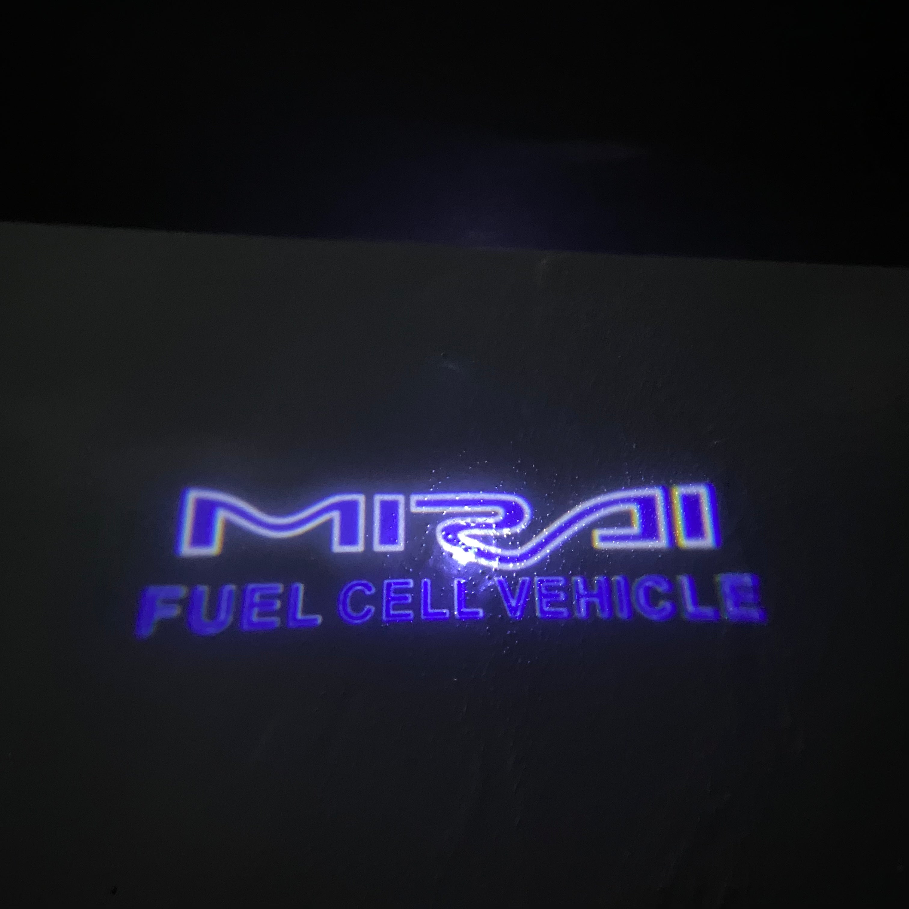 Toyota  MIRAI LOGO PROJECROTR LIGHTS Nr.02 (quantity 1 = 1 sets/2 door lights)T52