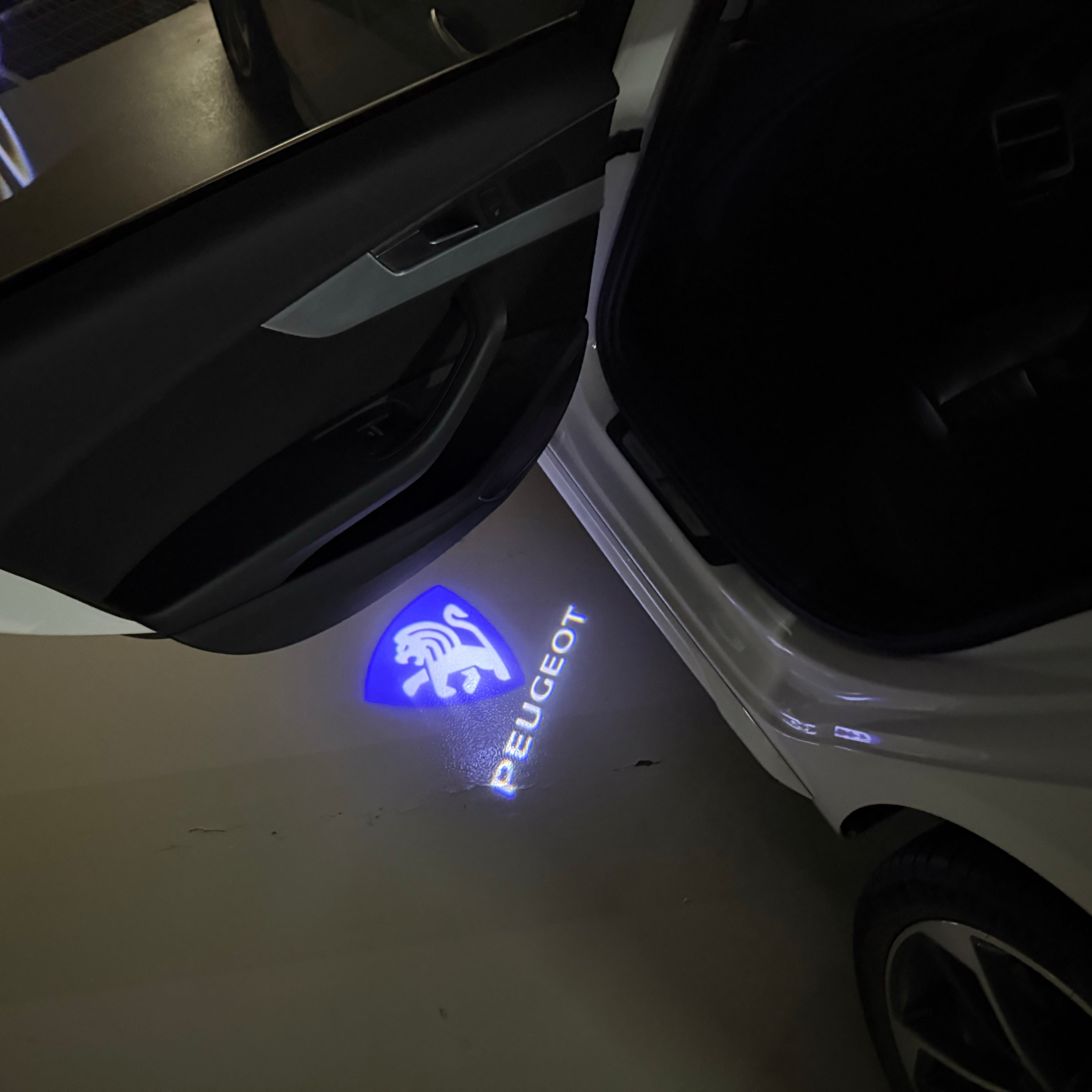 PEUGEOT ORIGINAL LOGO PROJECTOT LIGHTS    (quantity 1 = 2 Logo Films /2 door lights）Nr.30HH16