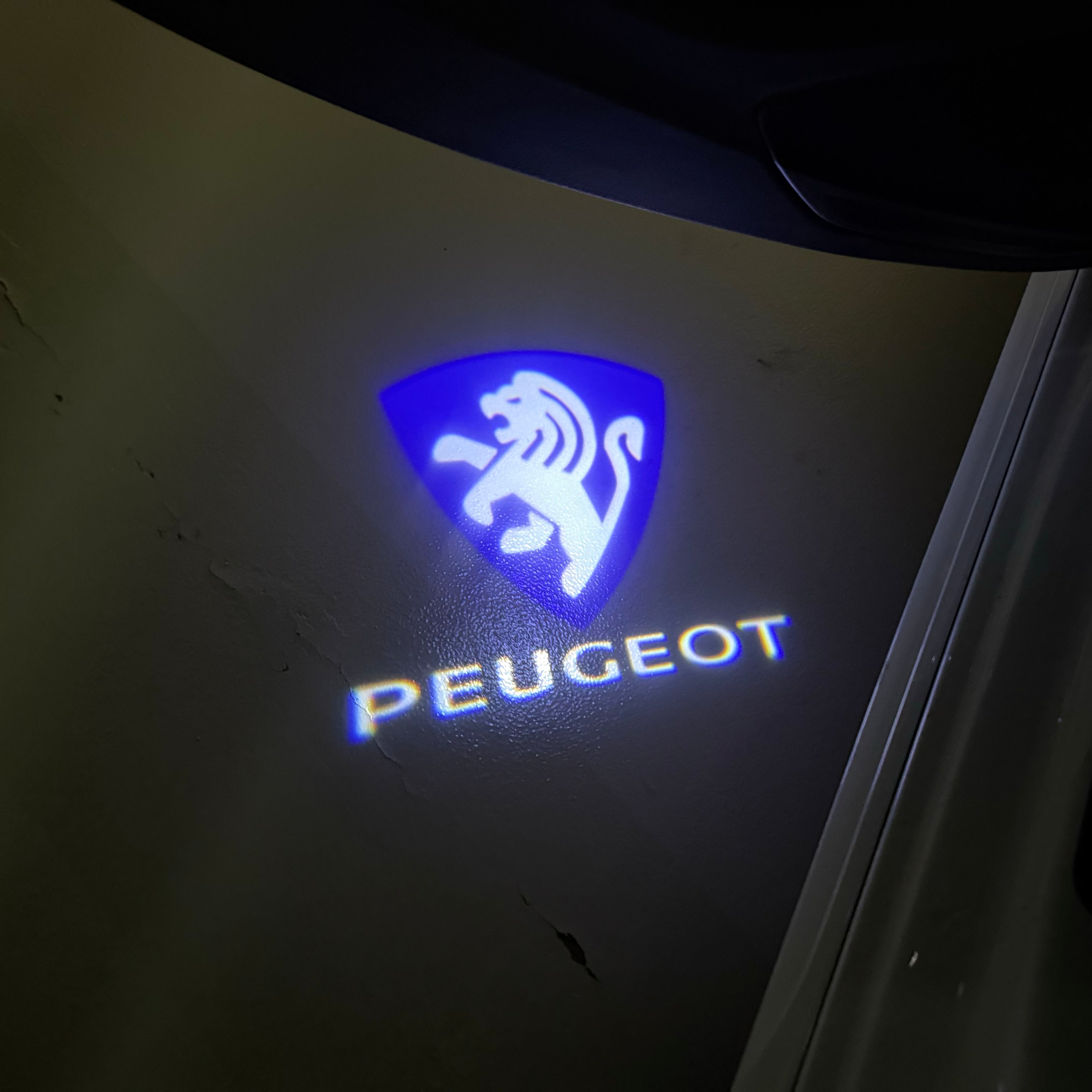 PEUGEOT ORIGINAL LOGO PROJECTOT LIGHTS    (quantity 1 = 2 Logo Films /2 door lights）Nr.30HH16