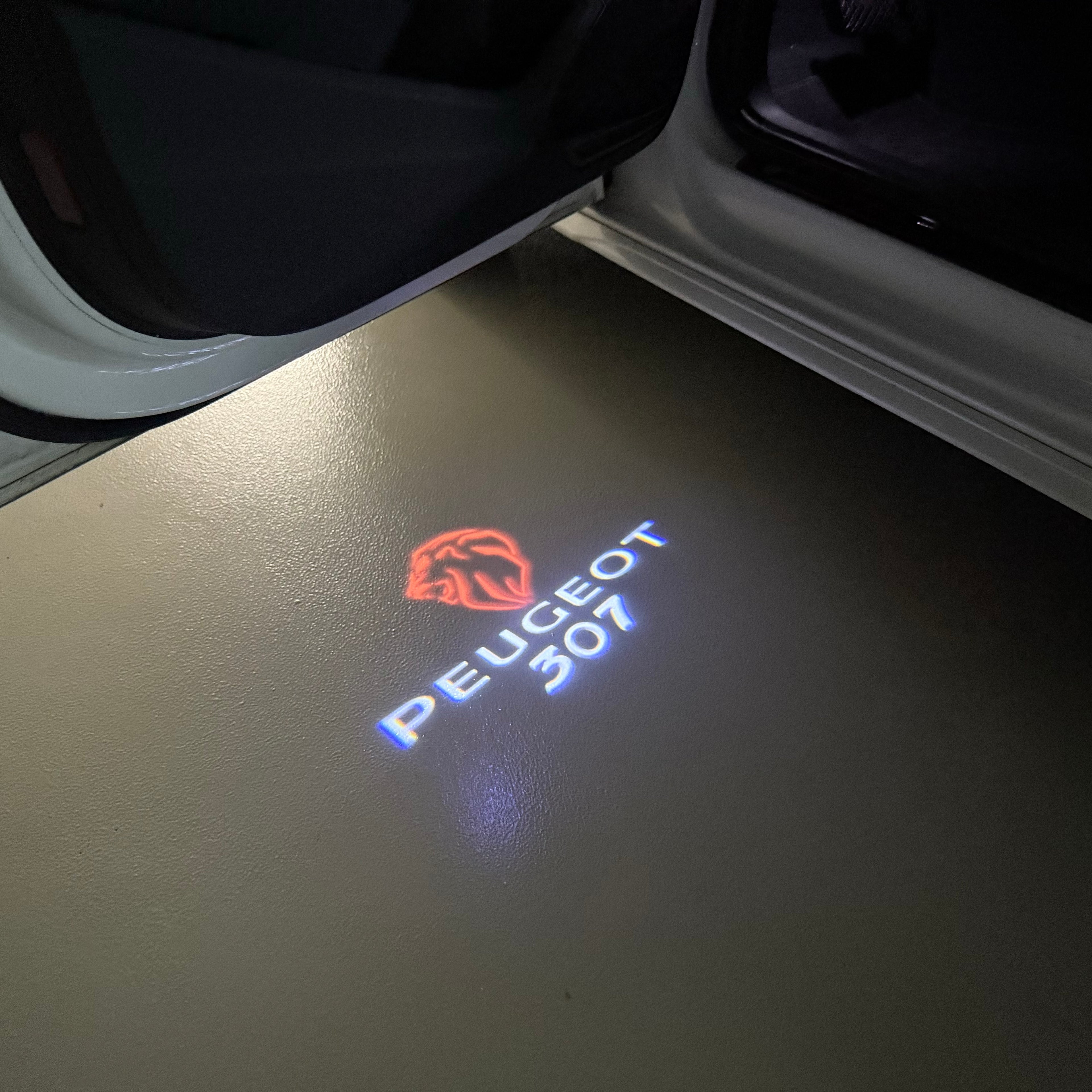 PEUGEOT 307  LOGO PROJECTOT LIGHTS    (quantity 1 = 2 Logo Films /2 door lights）Nr.30HH62