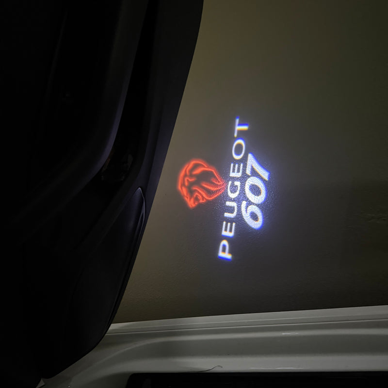 PEUGEOT 607 LOGO PROJECTOT LIGHTS    (quantity 1 = 2 Logo Films /2 door lights）Nr.30HH36