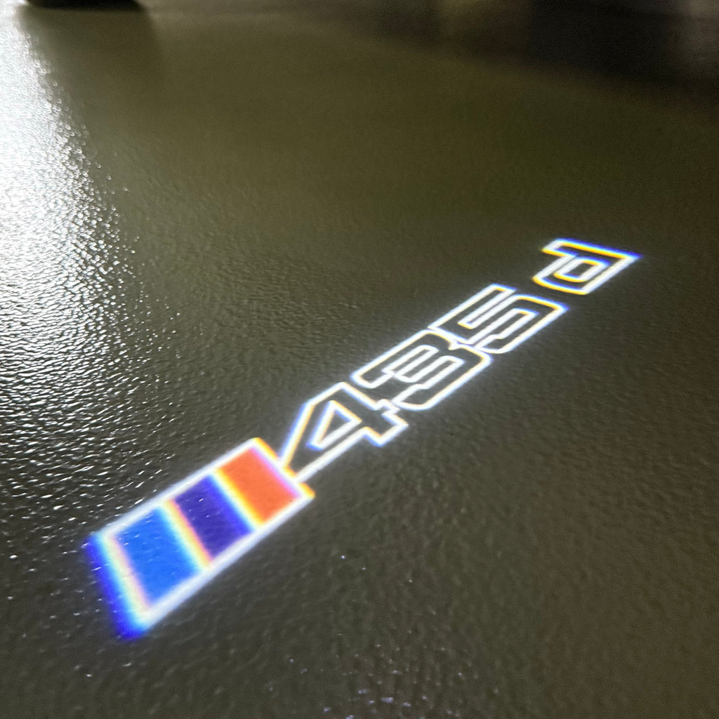 BMW  4  SERIES 435 d LOGO PROJECTOT LIGHTS (quantity 1 = 1 sets/2 door lights)Nr.bmw00187