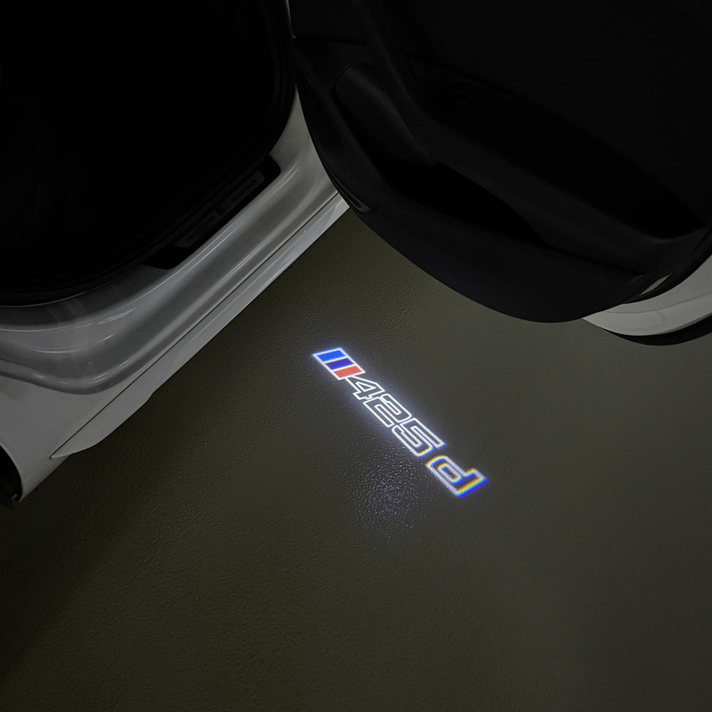 BMW  4 SERIES 425 d  LOGO PROJECTOT LIGHTS (quantity 1 = 1 sets/2 door lights)Nr.bmw00174