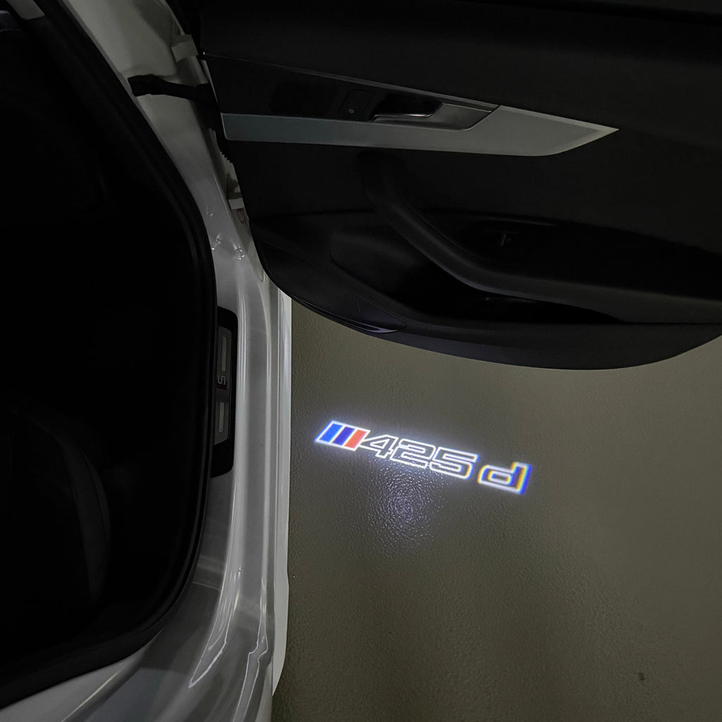 BMW  4 SERIES 425 d  LOGO PROJECTOT LIGHTS (quantity 1 = 1 sets/2 door lights)Nr.bmw00174