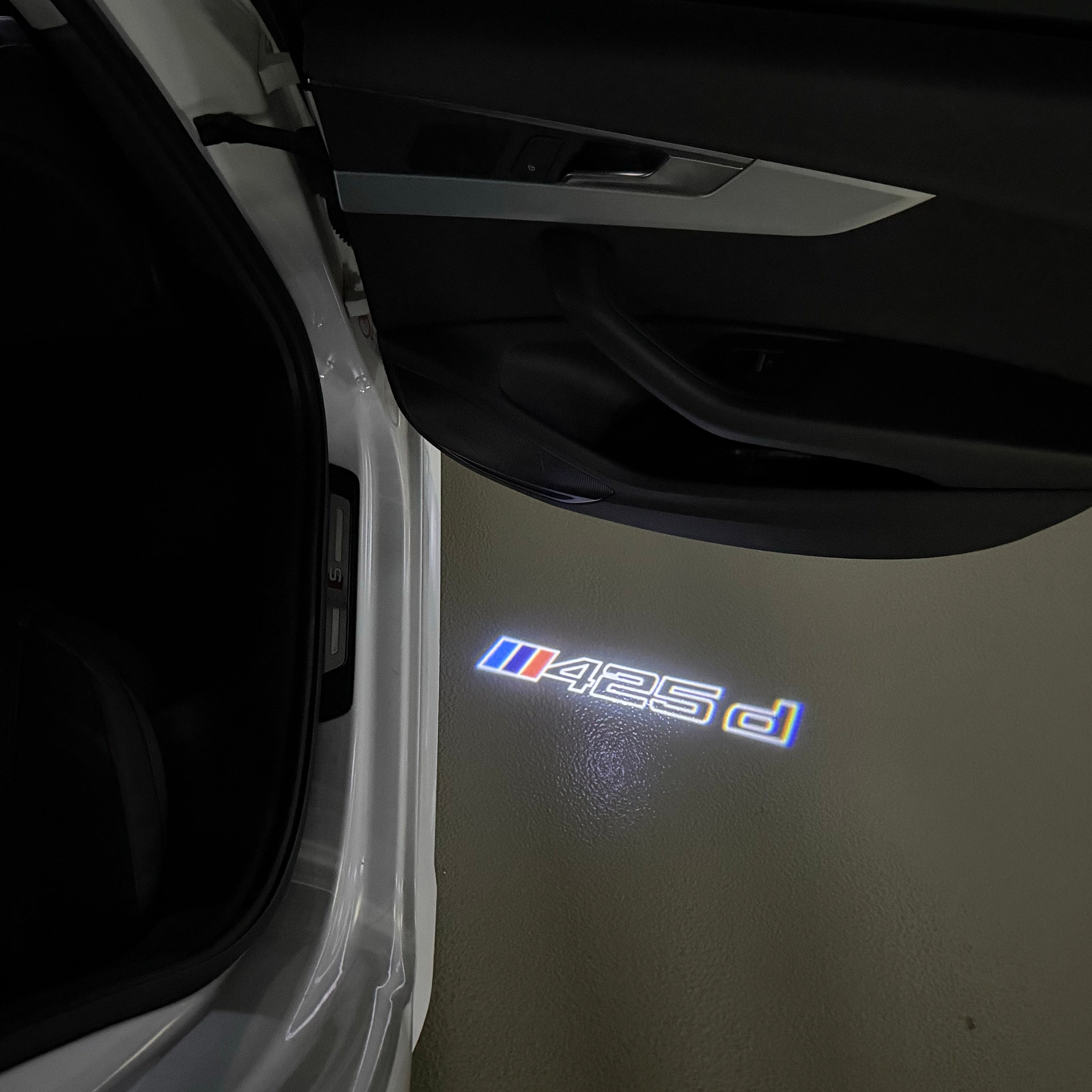BMW  4 SERIES 425 d  LOGO PROJECTOT LIGHTS (quantity 1 = 1 sets/2 door lights)Nr.bmw00174