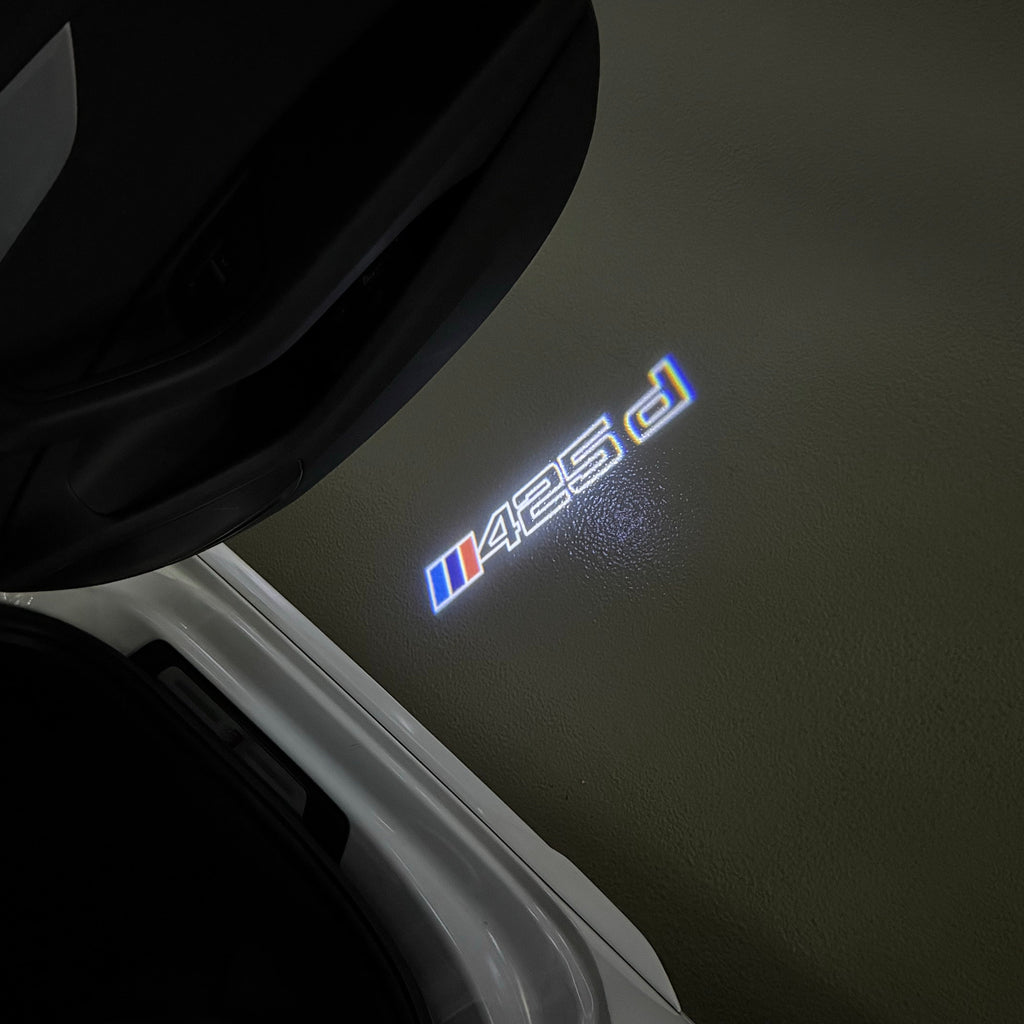 BMW  4 SERIES 425 d  LOGO PROJECTOT LIGHTS (quantity 1 = 1 sets/2 door lights)Nr.bmw00174