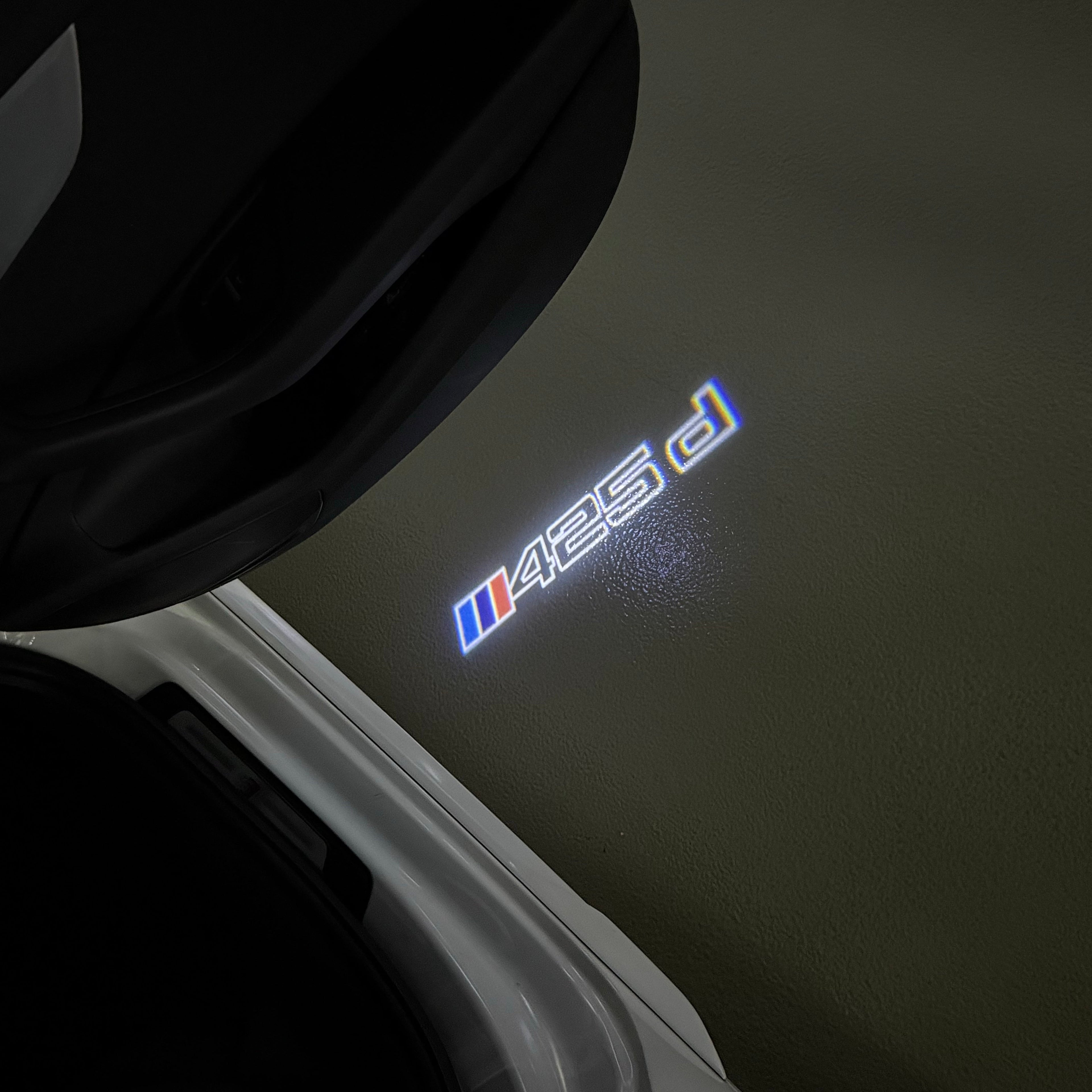 BMW  4 SERIES 425 d  LOGO PROJECTOT LIGHTS (quantity 1 = 1 sets/2 door lights)Nr.bmw00174