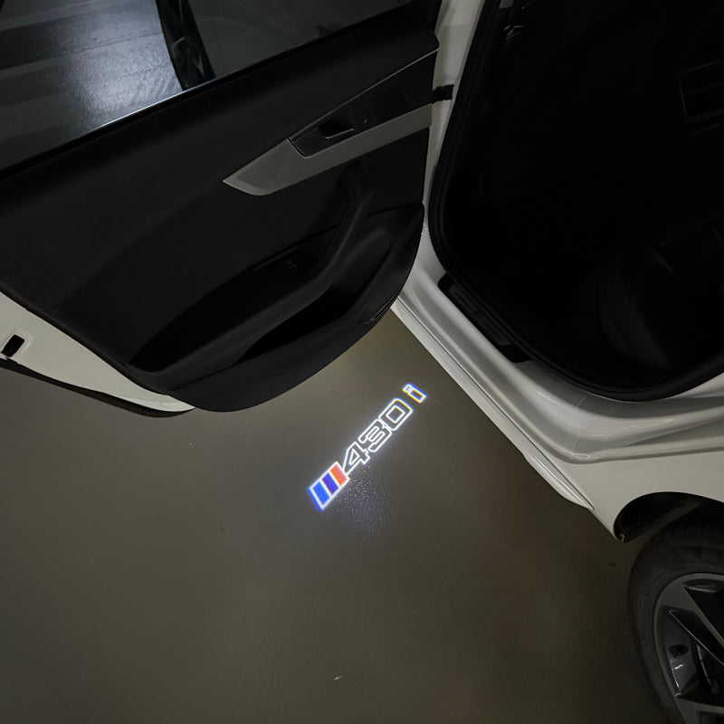 LUCI BMW M4 LOGO PROJECTOT Nr.6024 (quantità 1 = 1 set/2 luci porta)