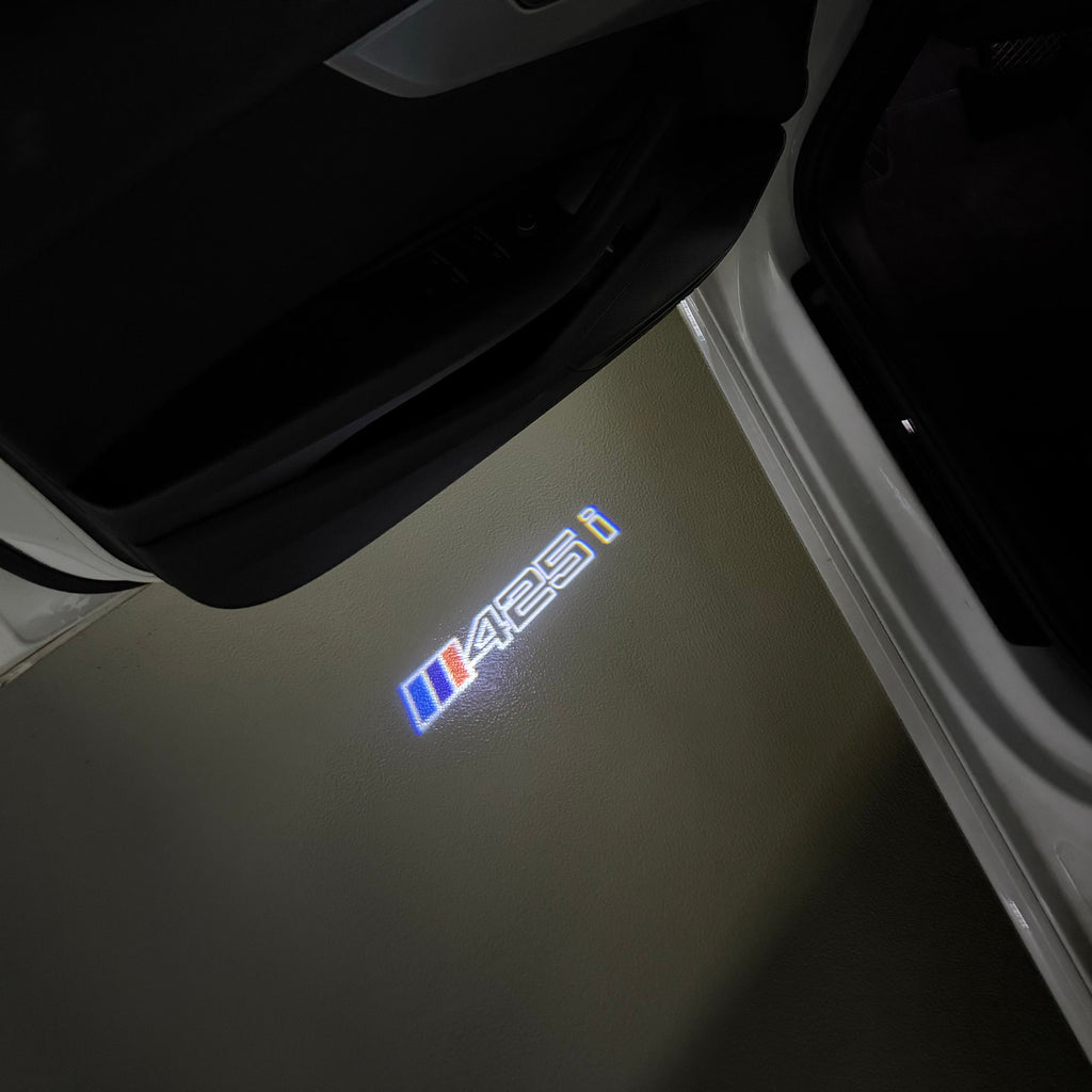 BMW  4 SERIES 425 i    LOGO PROJECTOT LIGHTS (quantity 1 = 1 sets/2 door lights)Nr.bmw00179