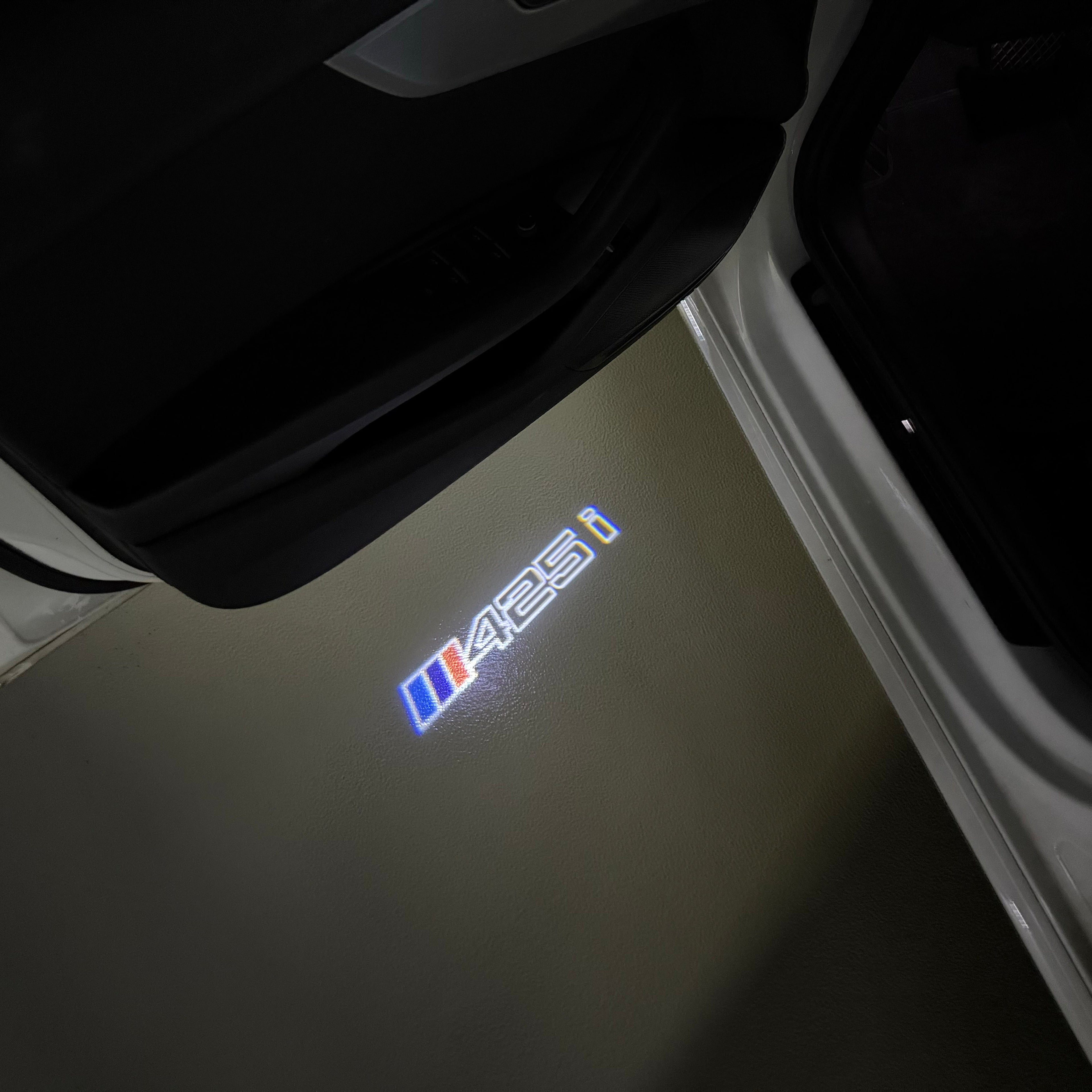 BMW  4 SERIES 425 i    LOGO PROJECTOT LIGHTS (quantity 1 = 1 sets/2 door lights)Nr.bmw00179