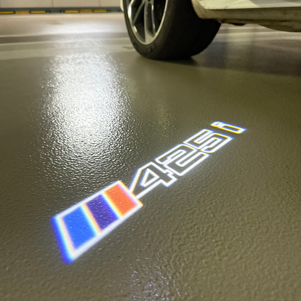 BMW  4 SERIES 425 i    LOGO PROJECTOT LIGHTS (quantity 1 = 1 sets/2 door lights)Nr.bmw00179