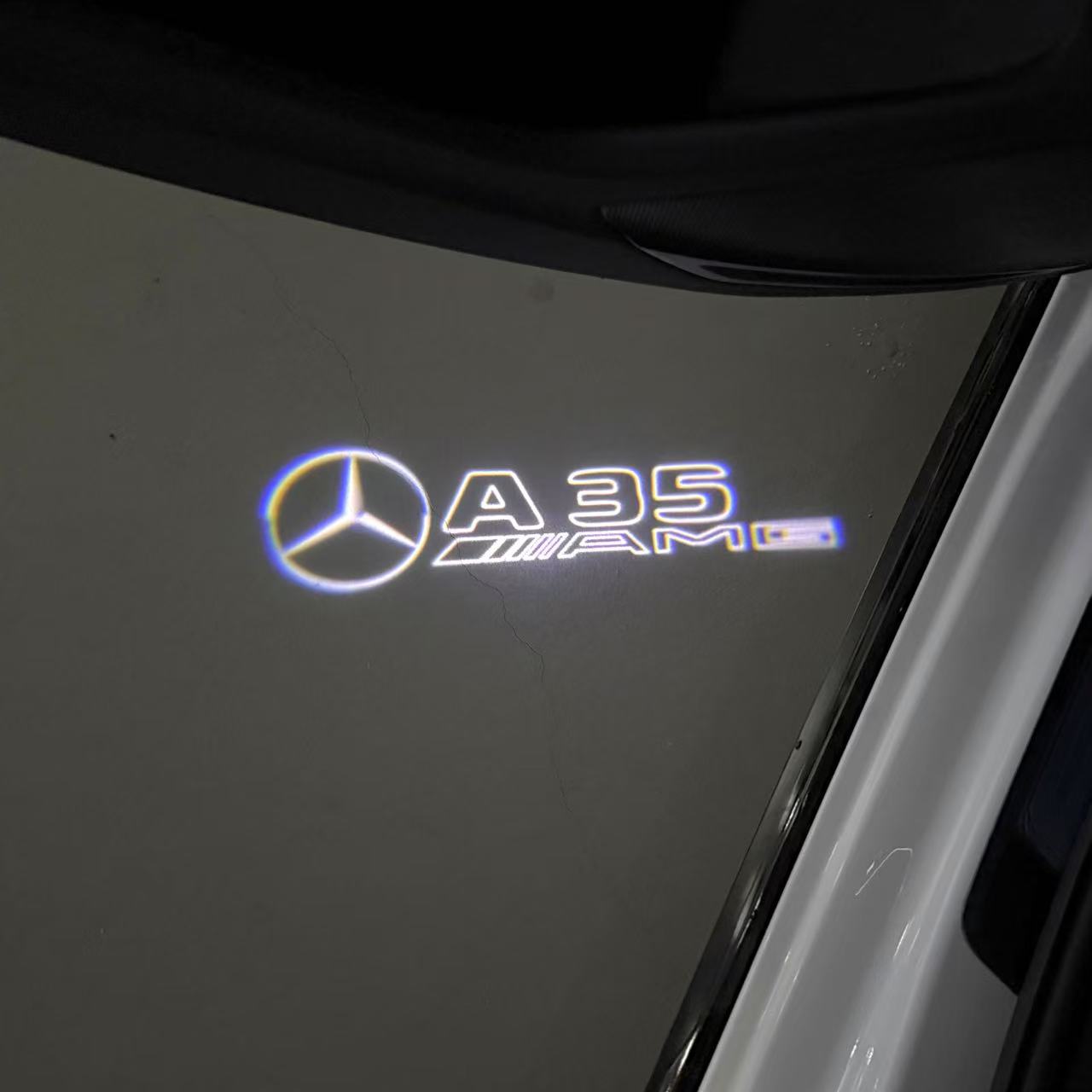 MERCEDES BENZ A35 AMG LOGO PROJECTOT LIGHTS  (quantity 1 = 1 set /2 door lights with 2 logo films)Nr.02M254