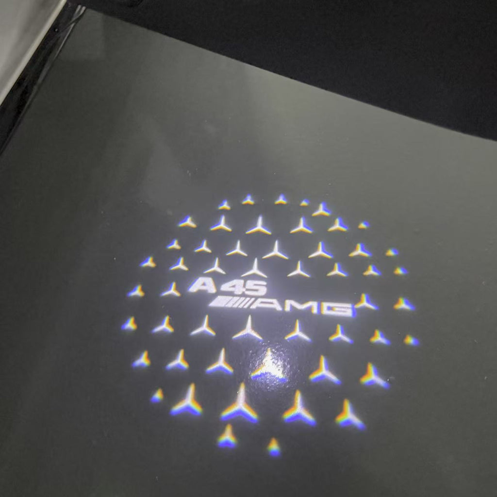 MERCEDES BENZ A45 AMG LOGO PROJECTOT LIGHTS  (quantity 1 = 1 set /2 door lights with 2 logo films)Nr.02M261