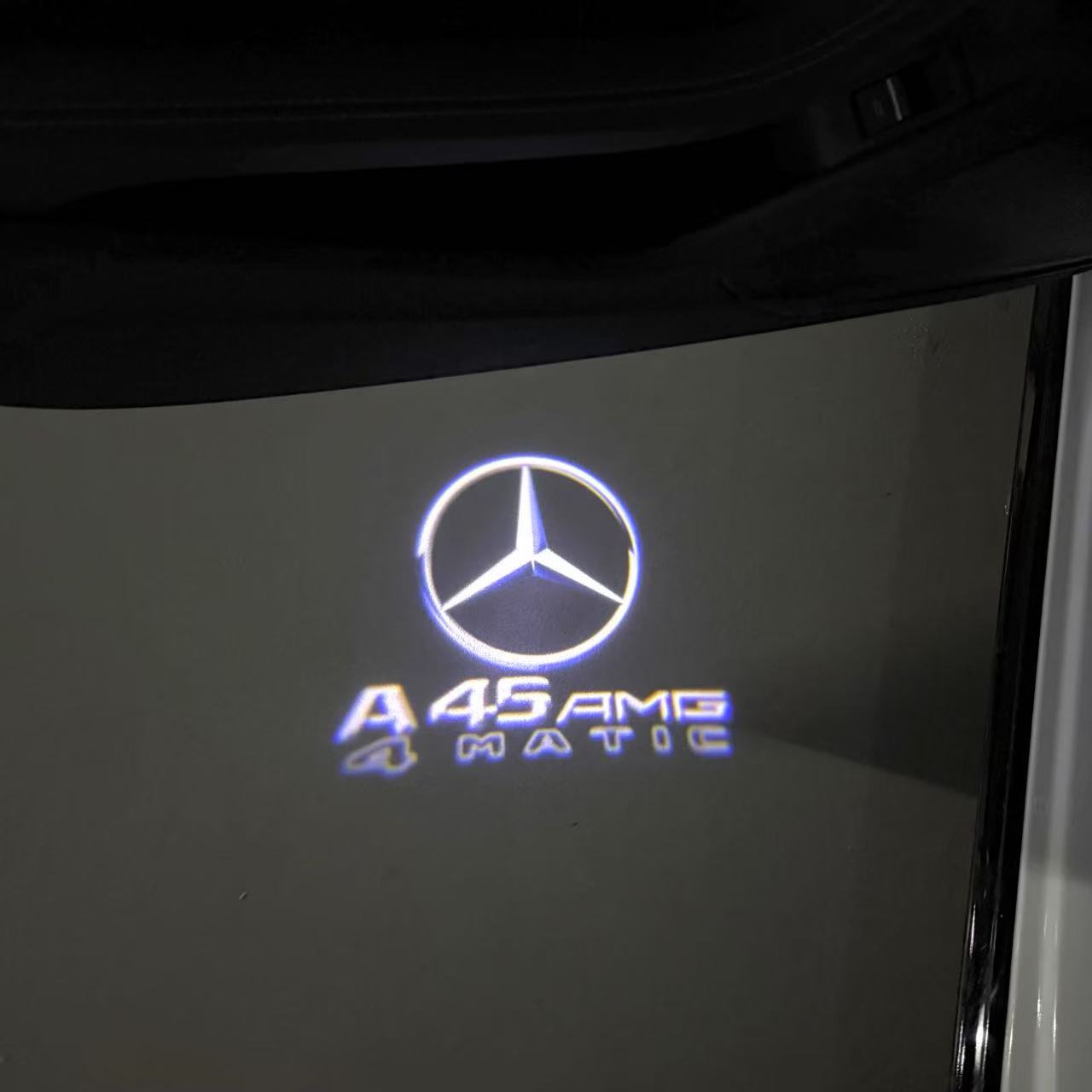MERCEDES BENZ A45 AMG LOGO PROJECTOT LIGHTS  (quantity 1 = 1 set /2 door lights with 2 logo films)Nr.02M259