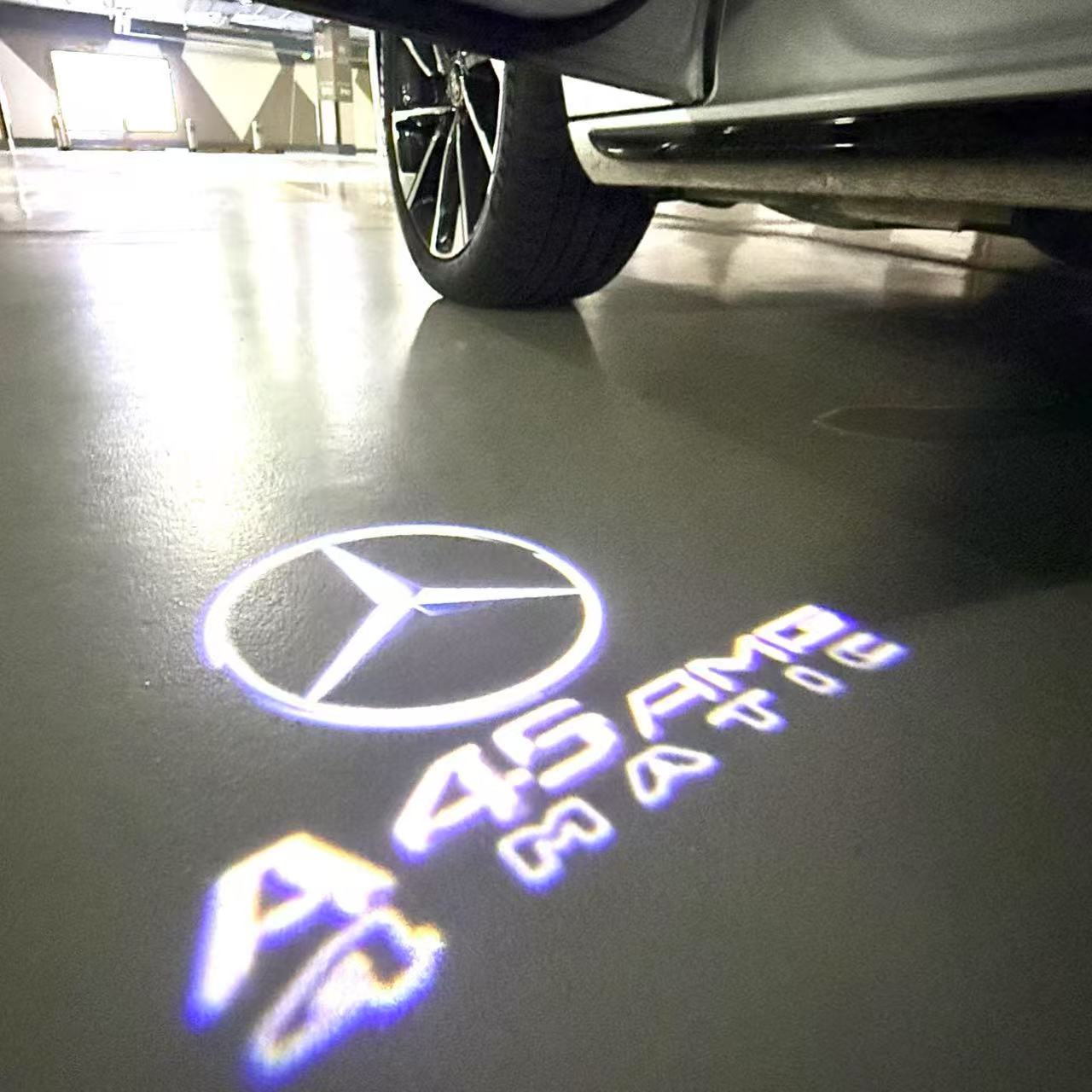 MERCEDES BENZ A45 AMG LOGO PROJECTOT LIGHTS  (quantity 1 = 1 set /2 door lights with 2 logo films)Nr.02M259
