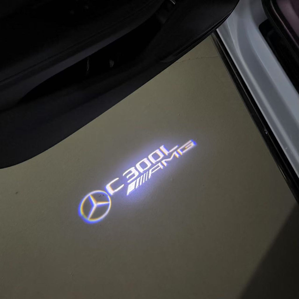 MERCEDES BENZ C300L LOGO PROJECTOT LIGHTS  (quantity 1 = 1 set /2 door lights with 2 logo films)Nr.02M43