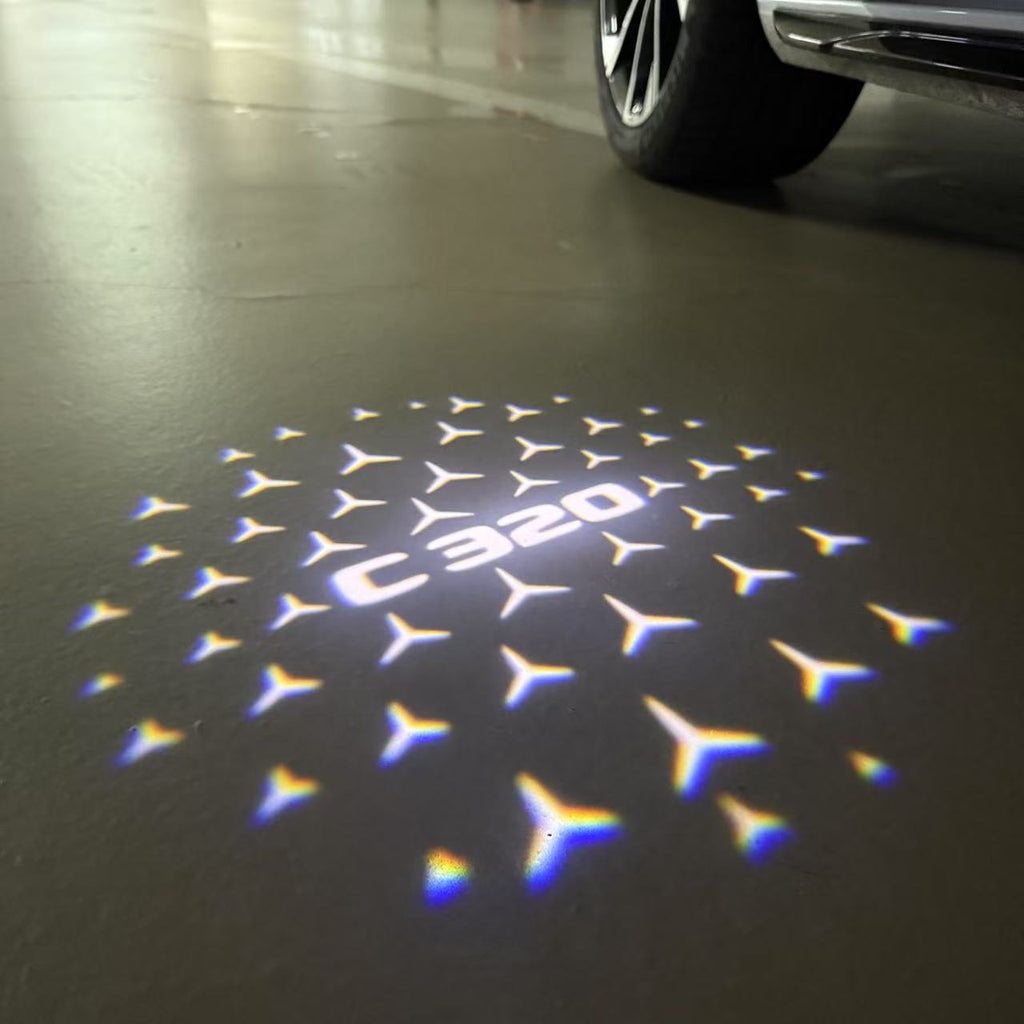 MERCEDES BENZ C320 LOGO PROJECTOT LIGHTS  (quantity 1 = 1 set /2 door lights with 2 logo films)Nr.02M53