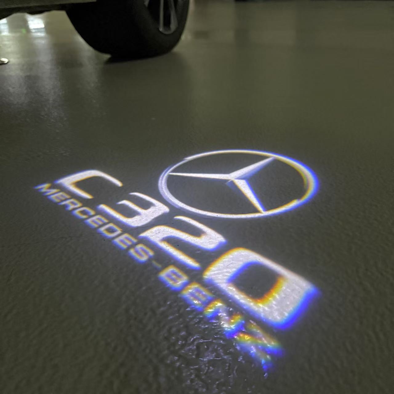 MERCEDES BENZ C320 LOGO PROJECTOT LIGHTS  (quantity 1 = 1 set /2 door lights with 2 logo films)Nr.02M47