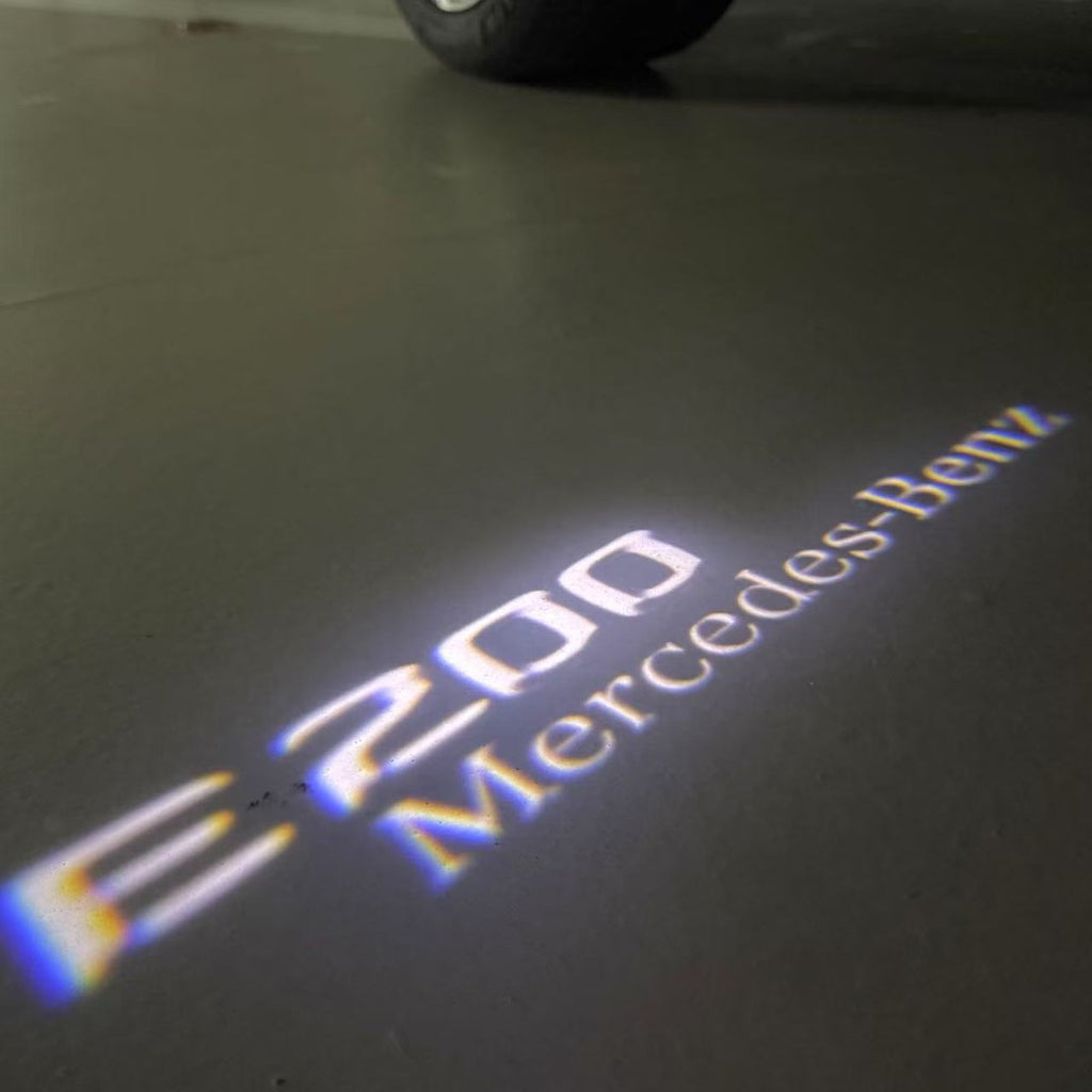 MERCEDES BENZ E200 LOGO PROJECTOT LIGHTS  (quantity 1 = 1 set /2 door lights with 2 logo films)Nr.02M83