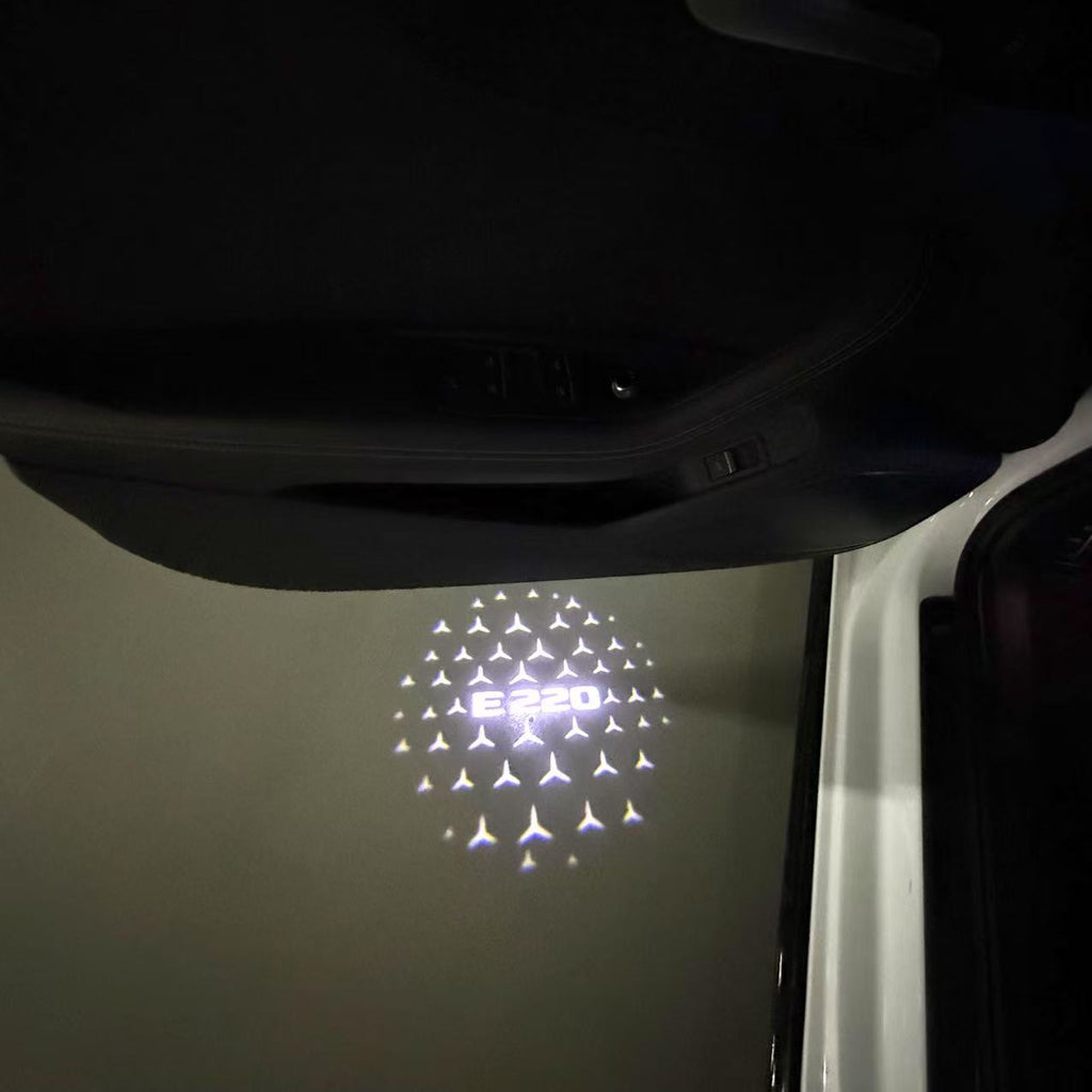 MERCEDES BENZ E220 LOGO PROJECTOT LIGHTS  (quantity 1 = 1 set /2 door lights with 2 logo films)Nr.02M90