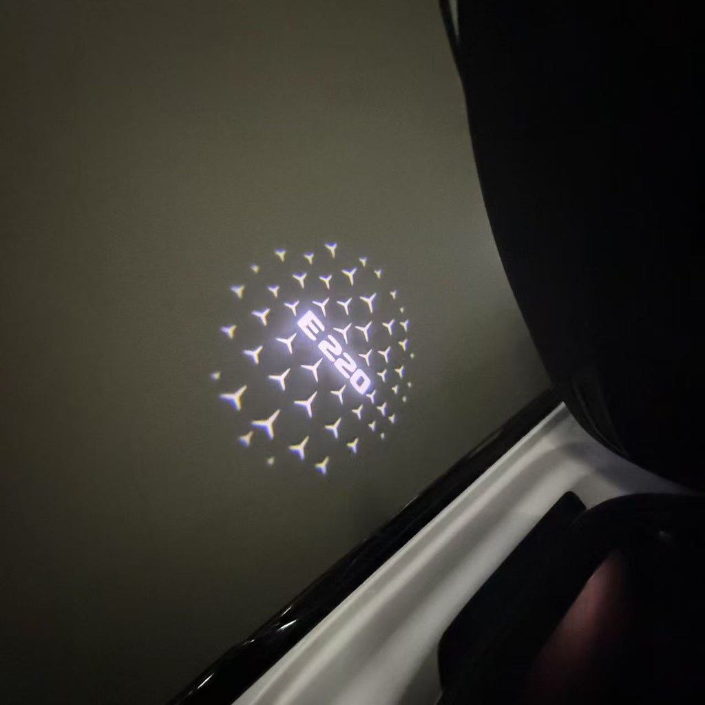MERCEDES BENZ E220 LOGO PROJECTOT LIGHTS  (quantity 1 = 1 set /2 door lights with 2 logo films)Nr.02M90