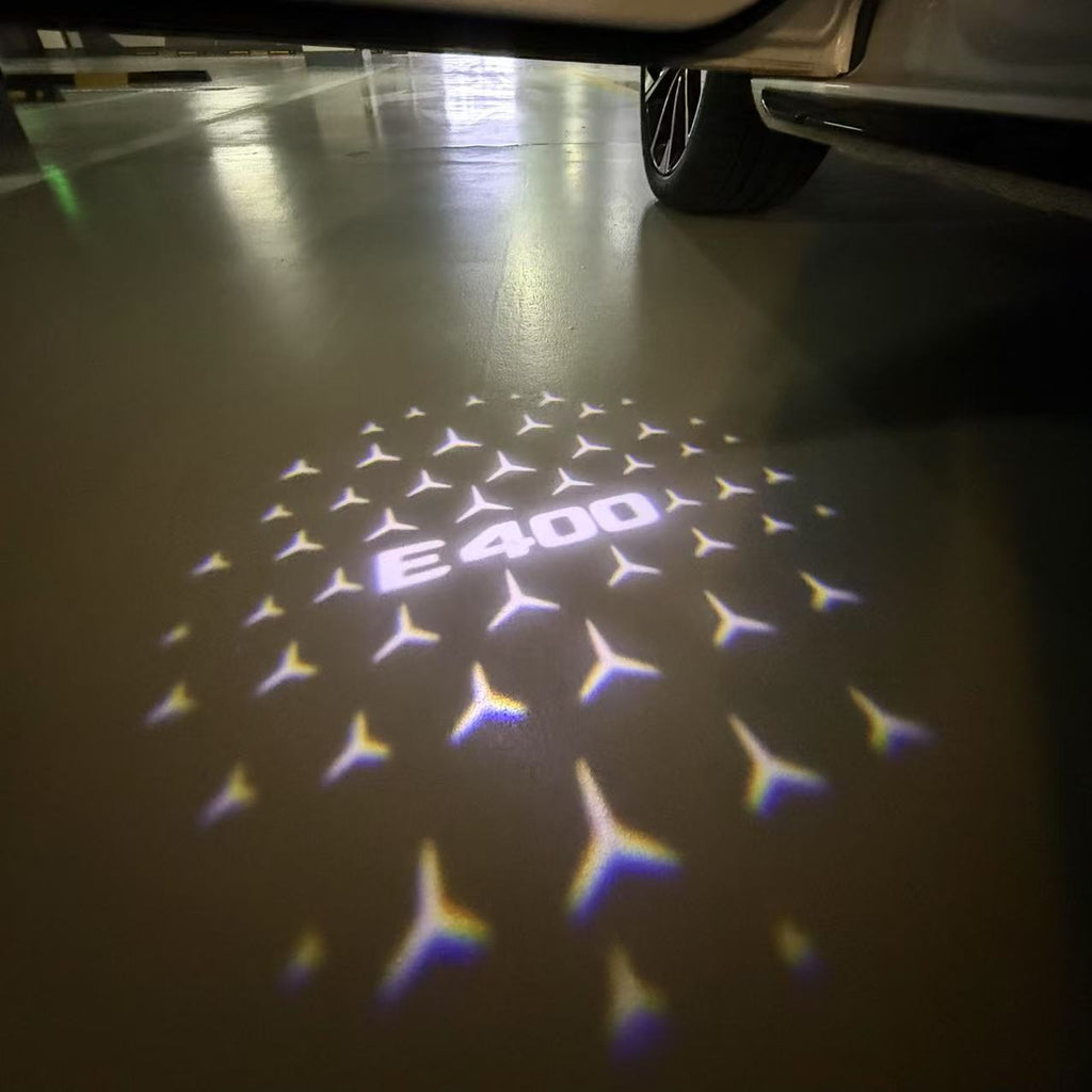 MERCEDES BENZ E400 LOGO PROJECTOT LIGHTS  (quantity 1 = 1 set /2 door lights with 2 logo films)Nr.02M102