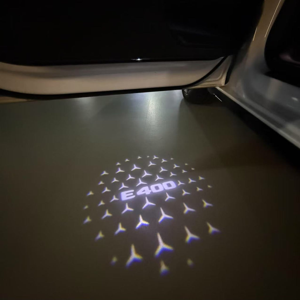 MERCEDES BENZ E400 LOGO PROJECTOT LIGHTS  (quantity 1 = 1 set /2 door lights with 2 logo films)Nr.02M102