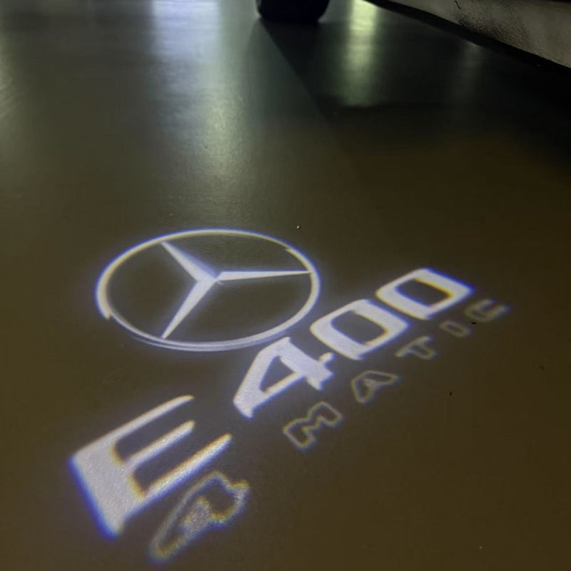 MERCEDES BENZ E400 LOGO PROJECTOT LIGHTS  (quantity 1 = 1 set /2 door lights with 2 logo films)Nr.02M84